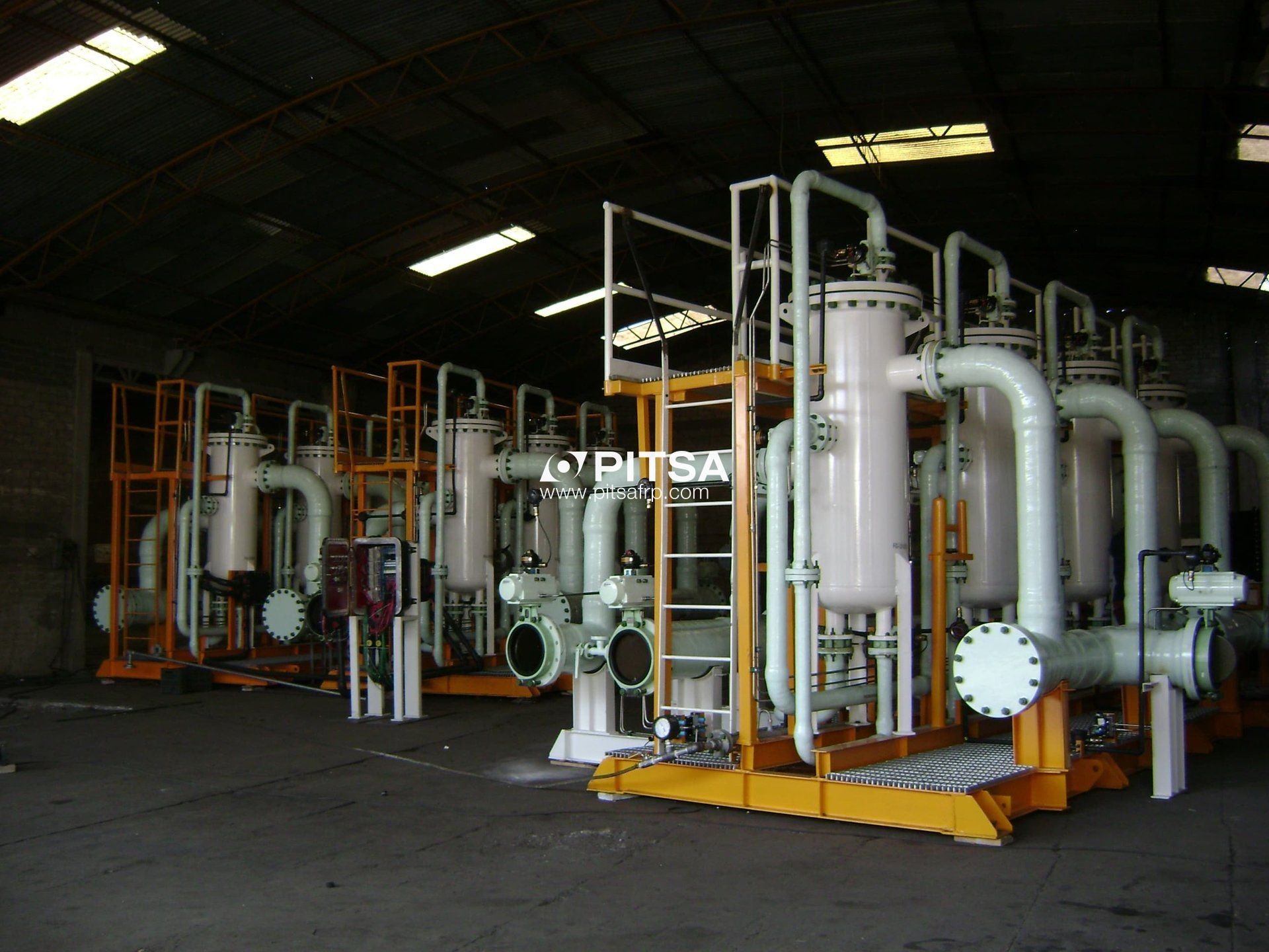 Complex isometric FRP pipes installed at the customer's facility, ready for testing.