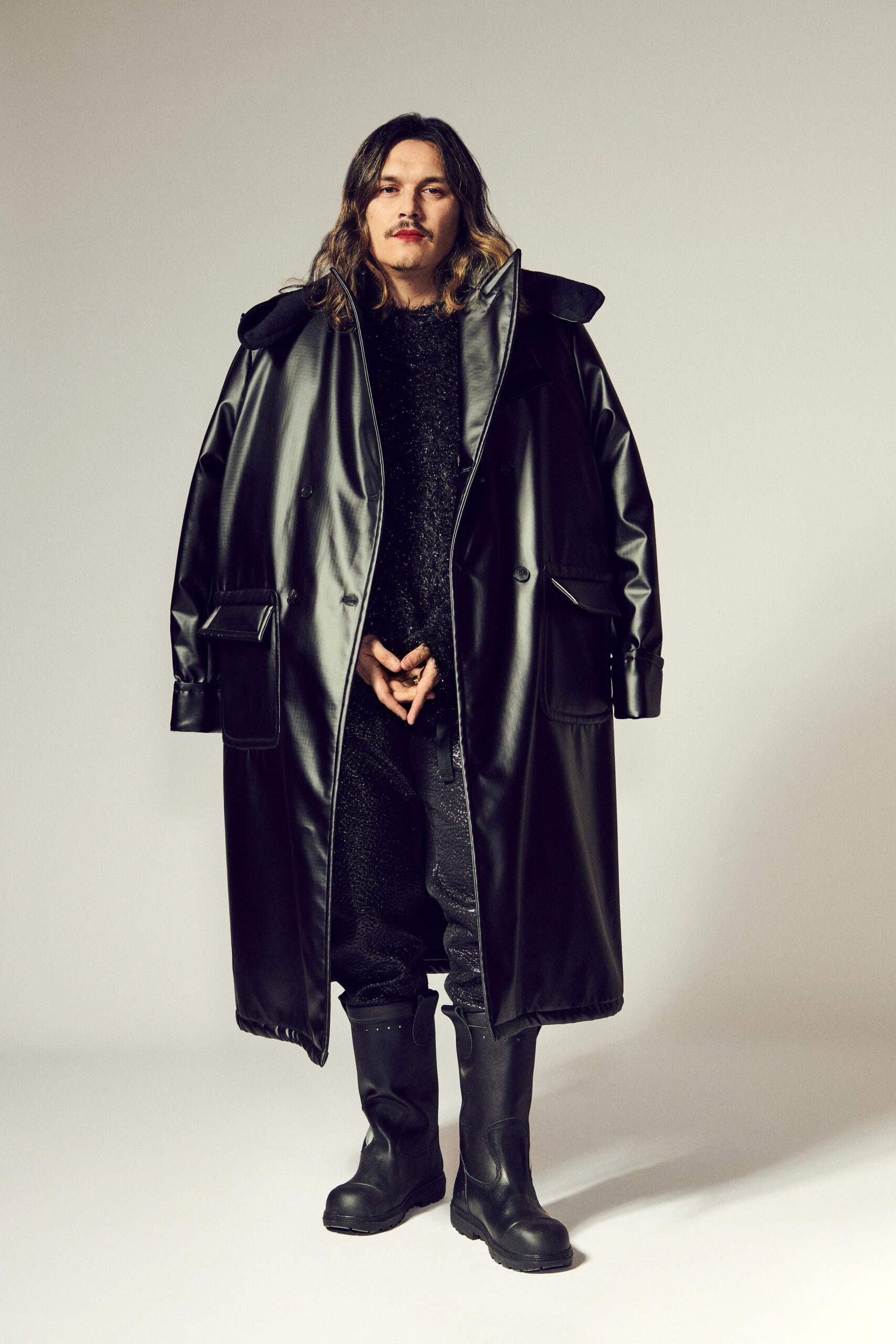 oversized black vinyl coat