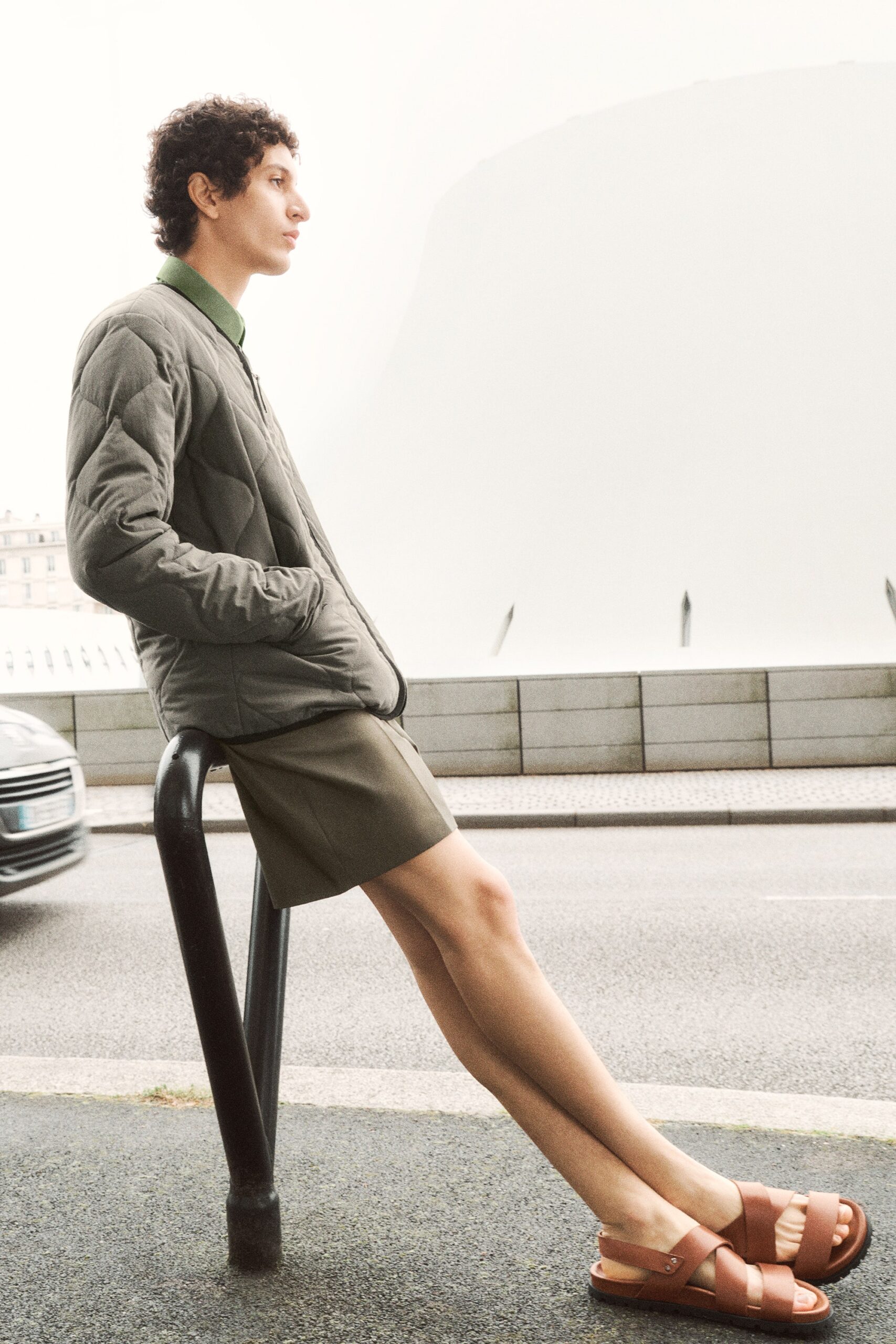 gray fitted jacket with green shorts