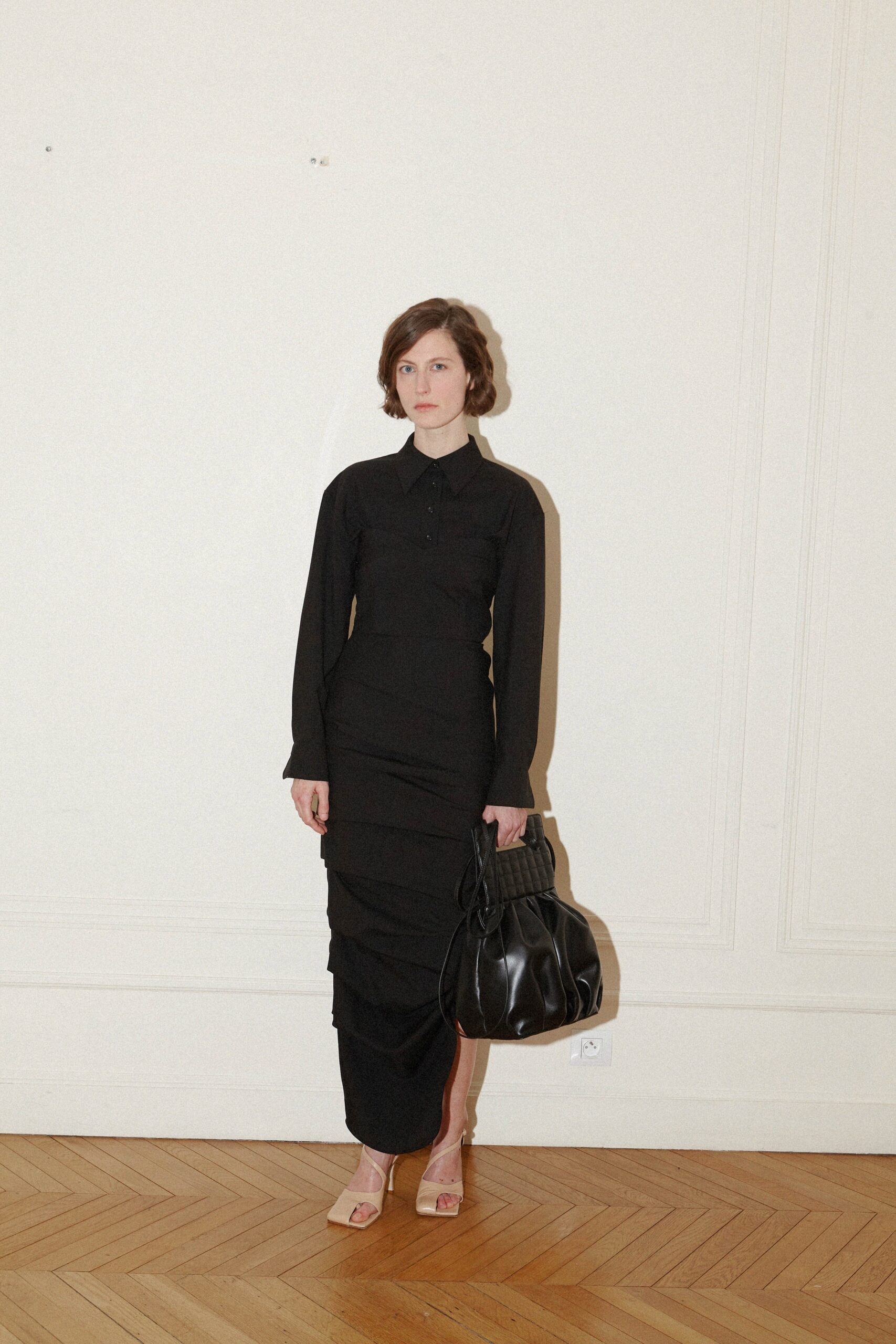 black fitted long-sleeve dress