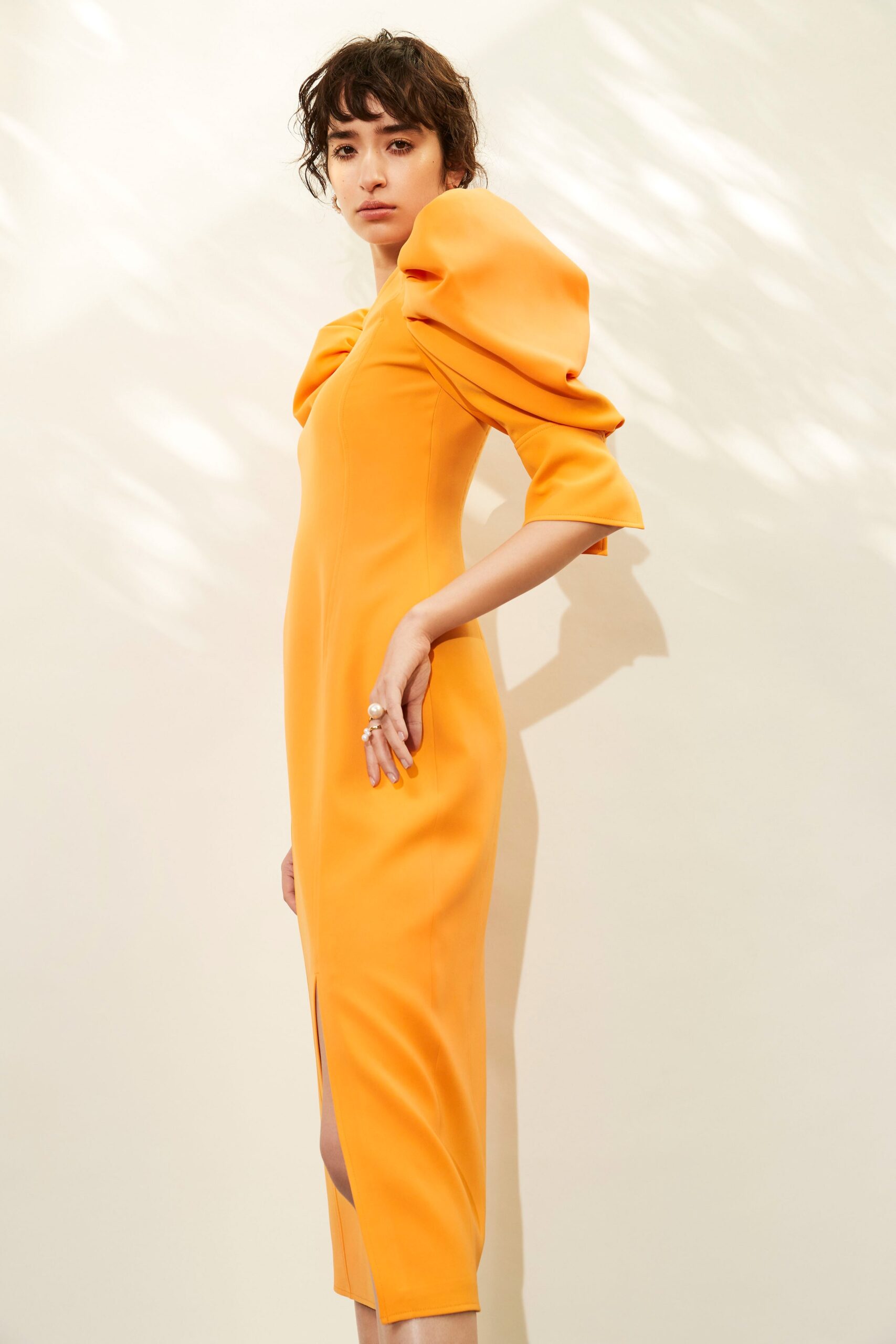 fitted orange midi dress