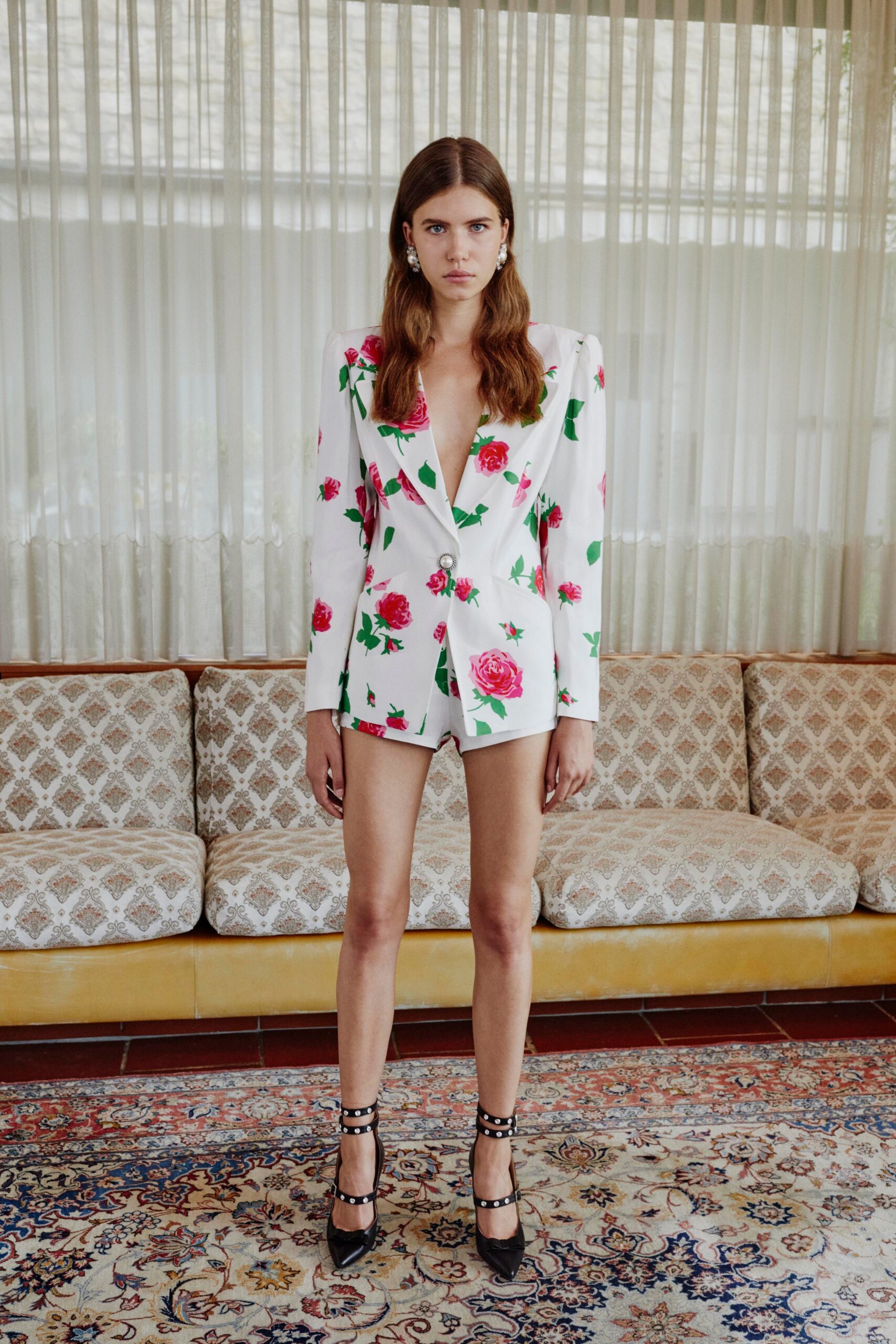 white floral blazer with black shorts