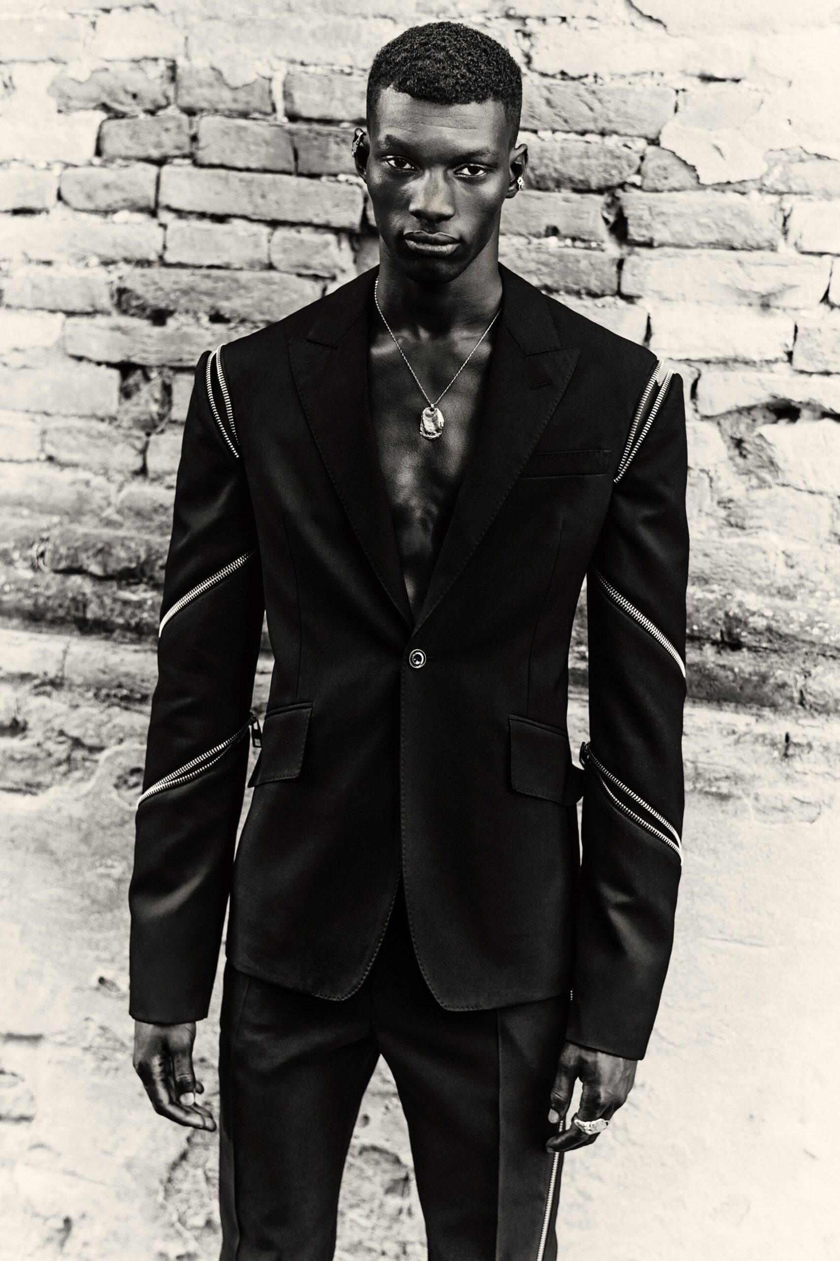 black wool long-sleeve collared tailored buttoned zippered blazer