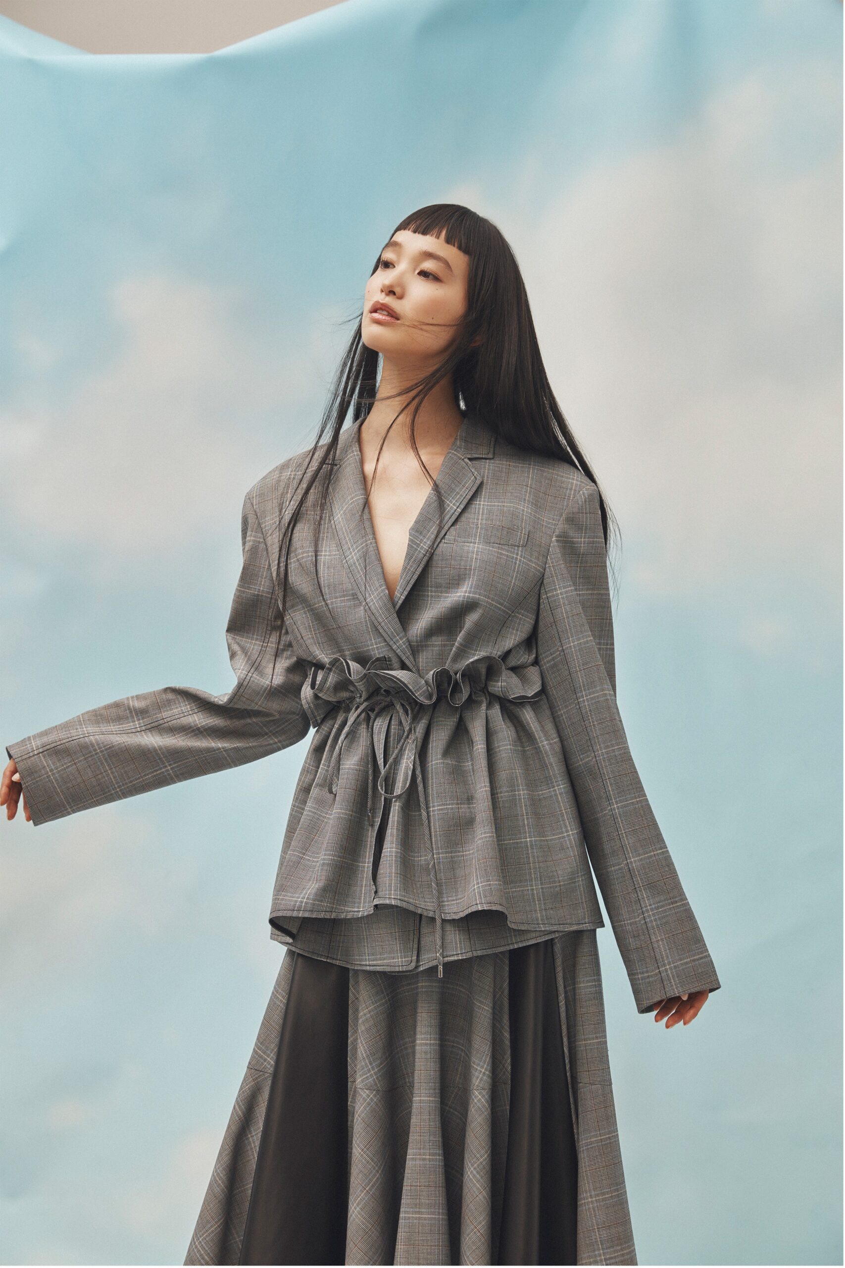 gray checked blazer and black skirt
