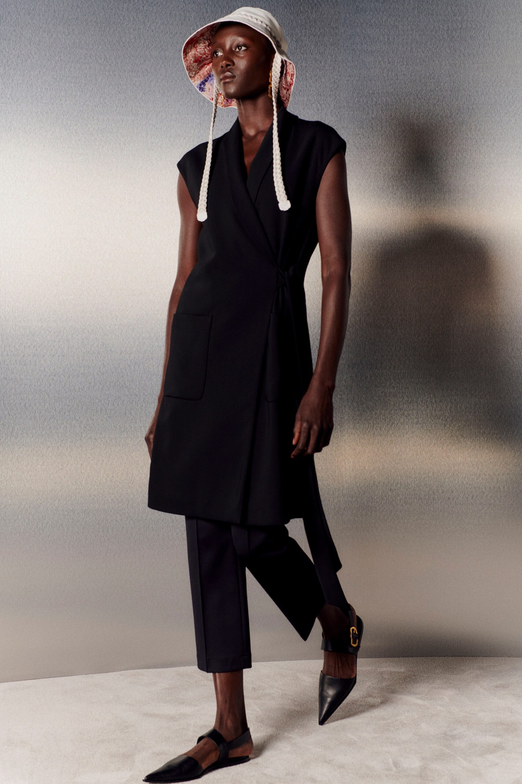 black fitted dress with tailored pants