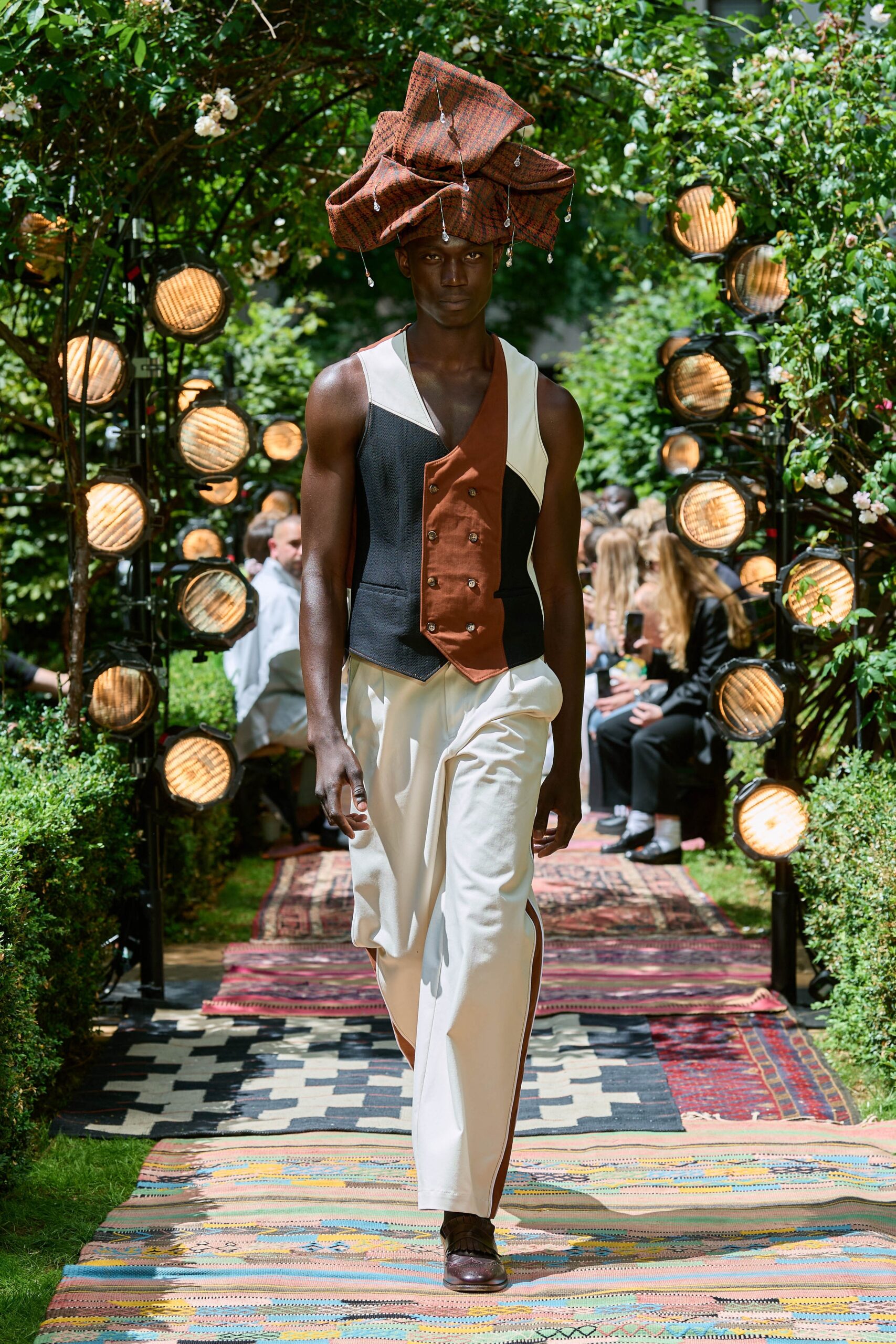 black and brown fitted vest with relaxed pants