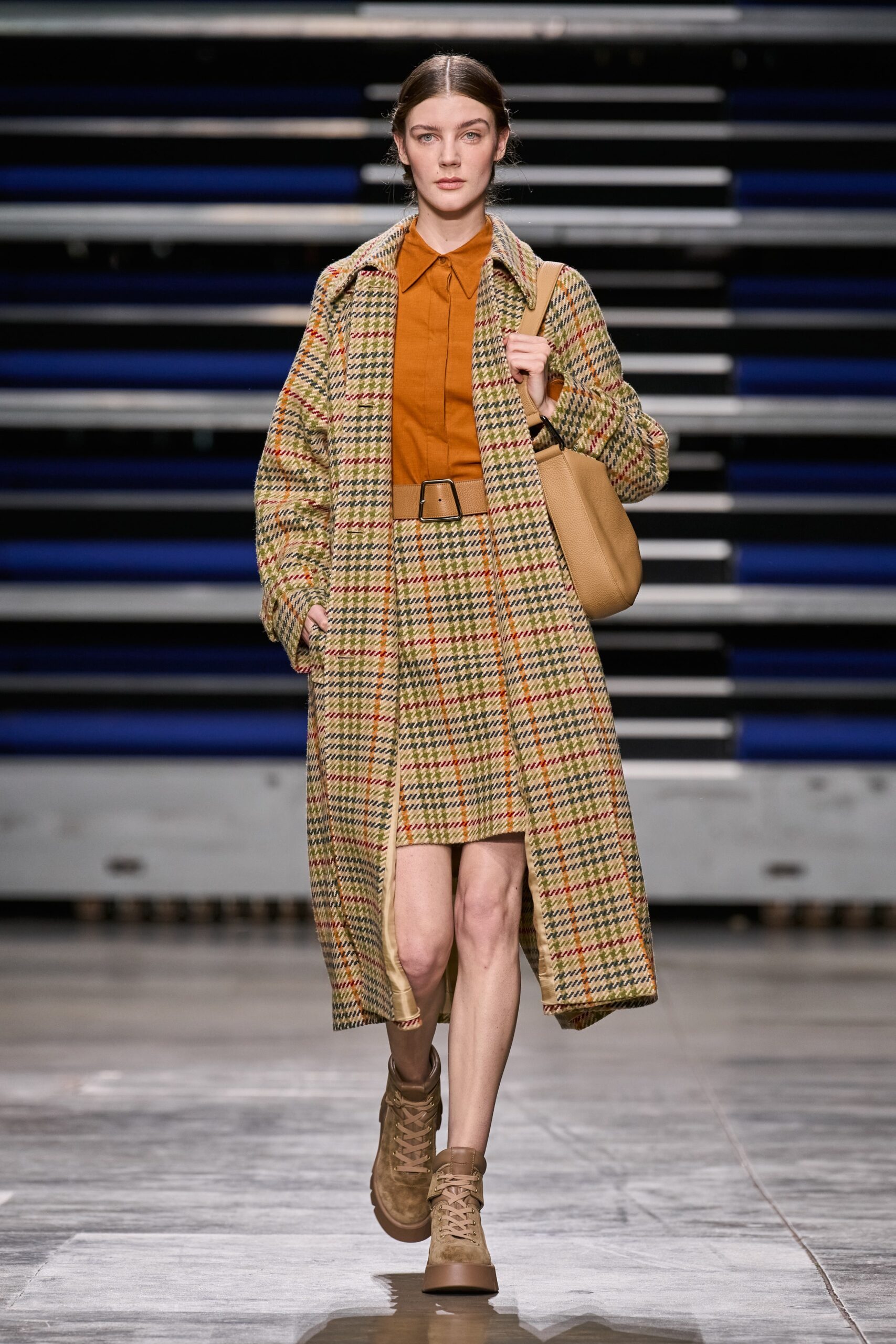 checked wool coat with orange shirt