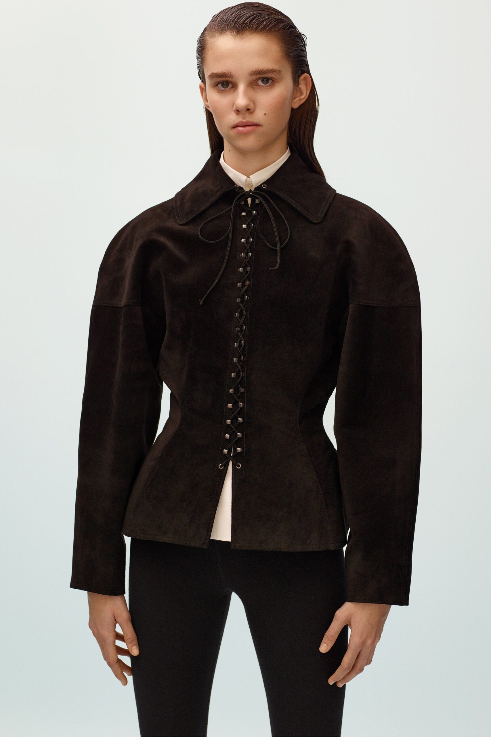 black suede fitted jacket and white shirt