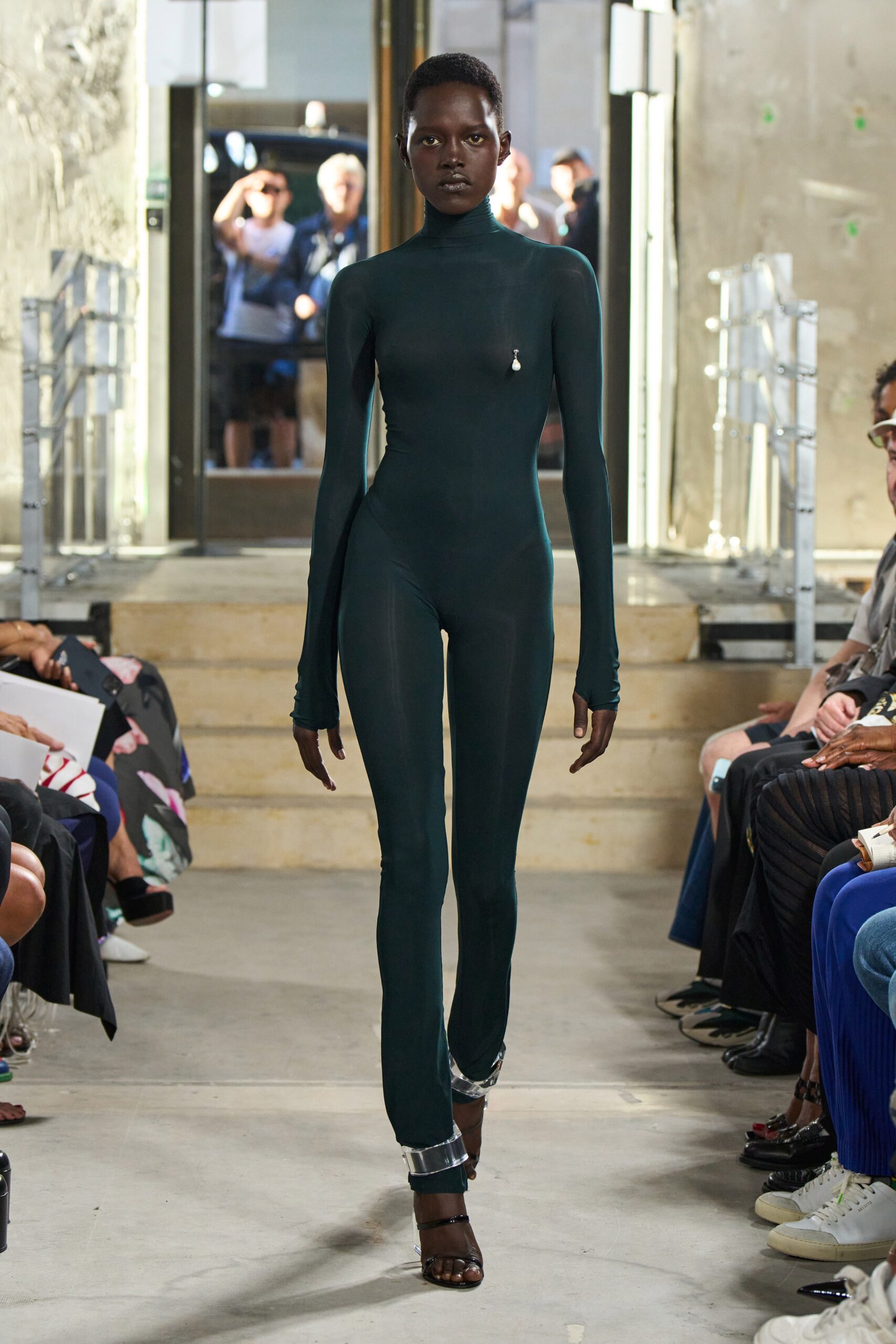 fitted green neoprene catsuit