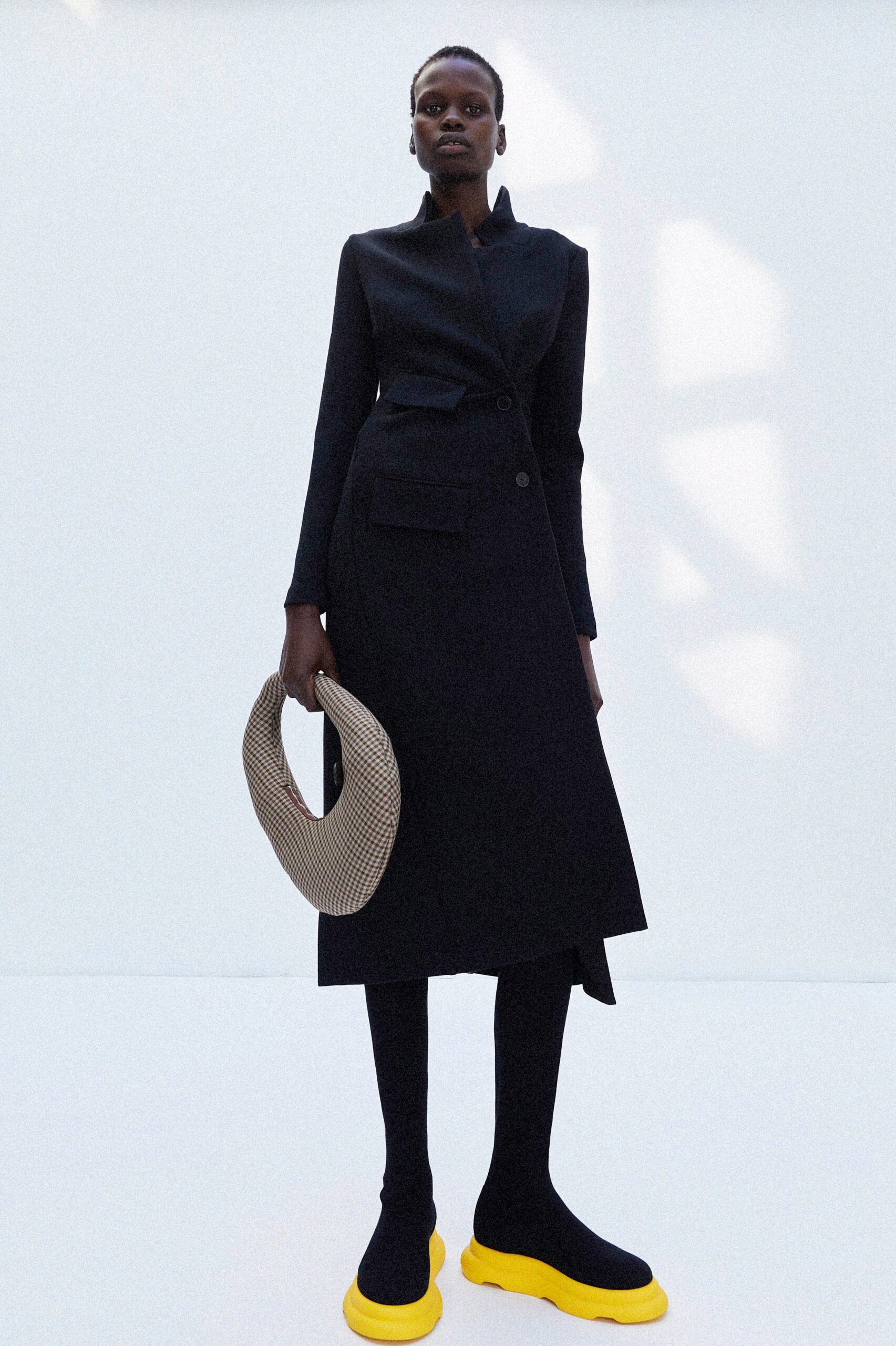 black tailored blazer and midi skirt
