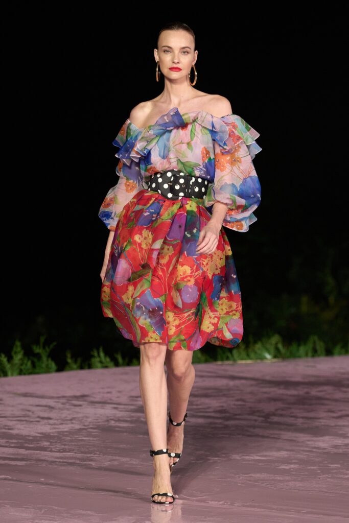 A relaxed multicolor ruffled off-shoulder dress with a flared silhouette.