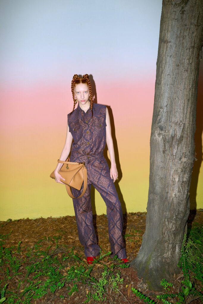A relaxed multicolor printed sleeveless jumpsuit with a collared design.