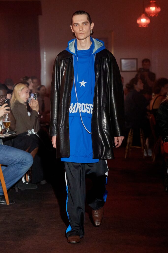 black leather coat blue hoodie