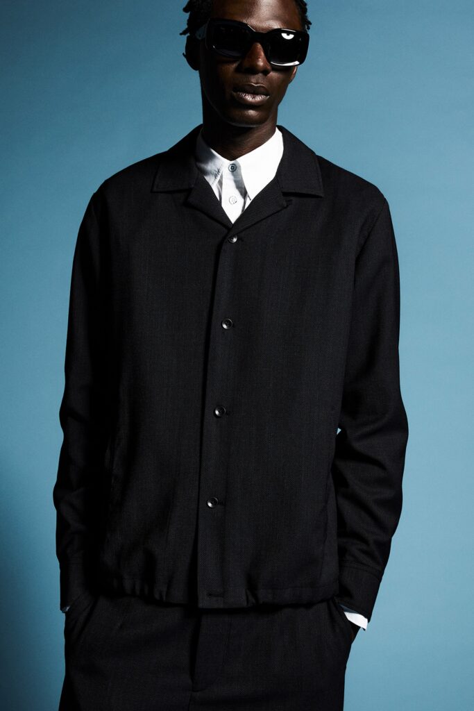 black relaxed jacket and white shirt