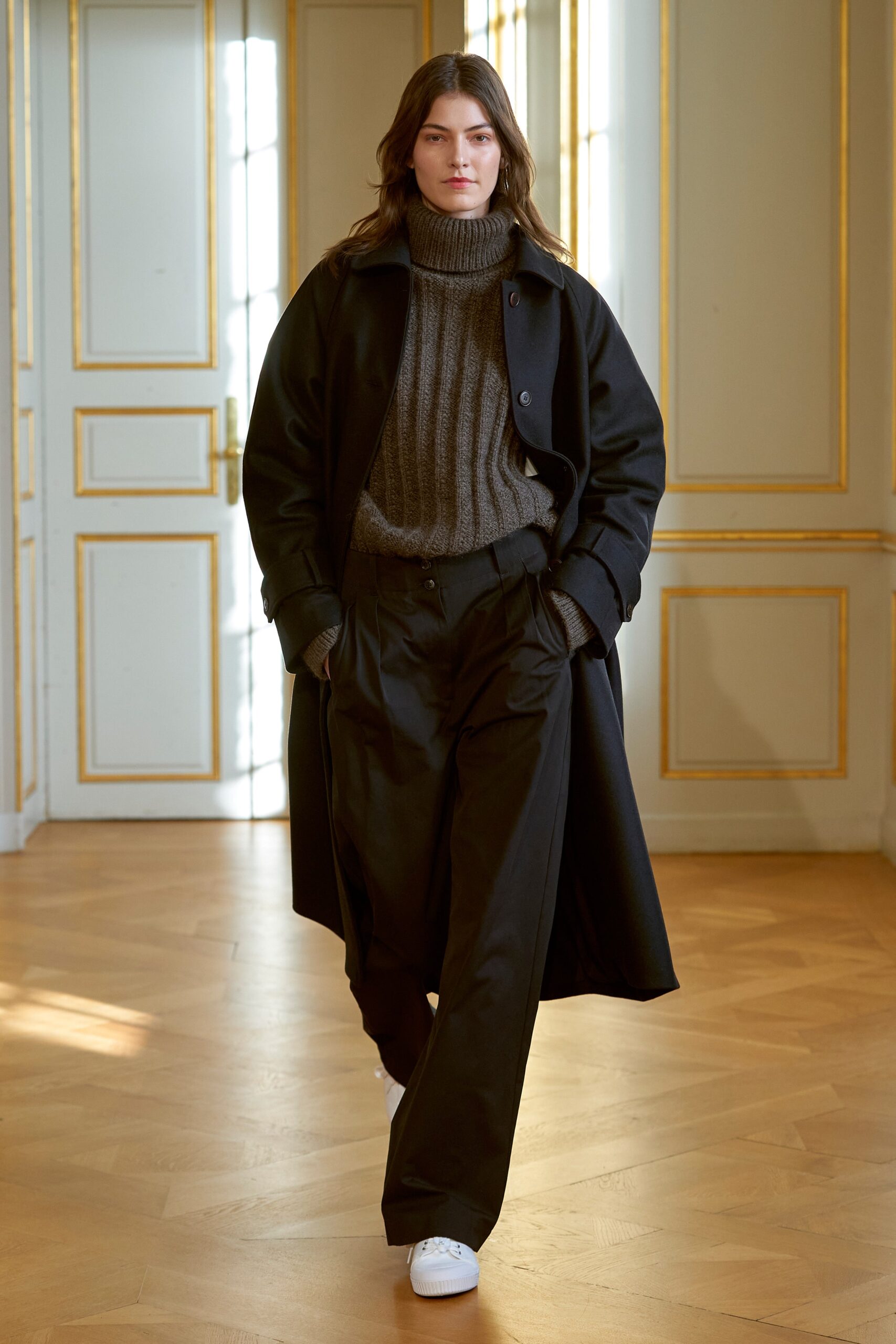 black coat gray sweater wide-leg pants