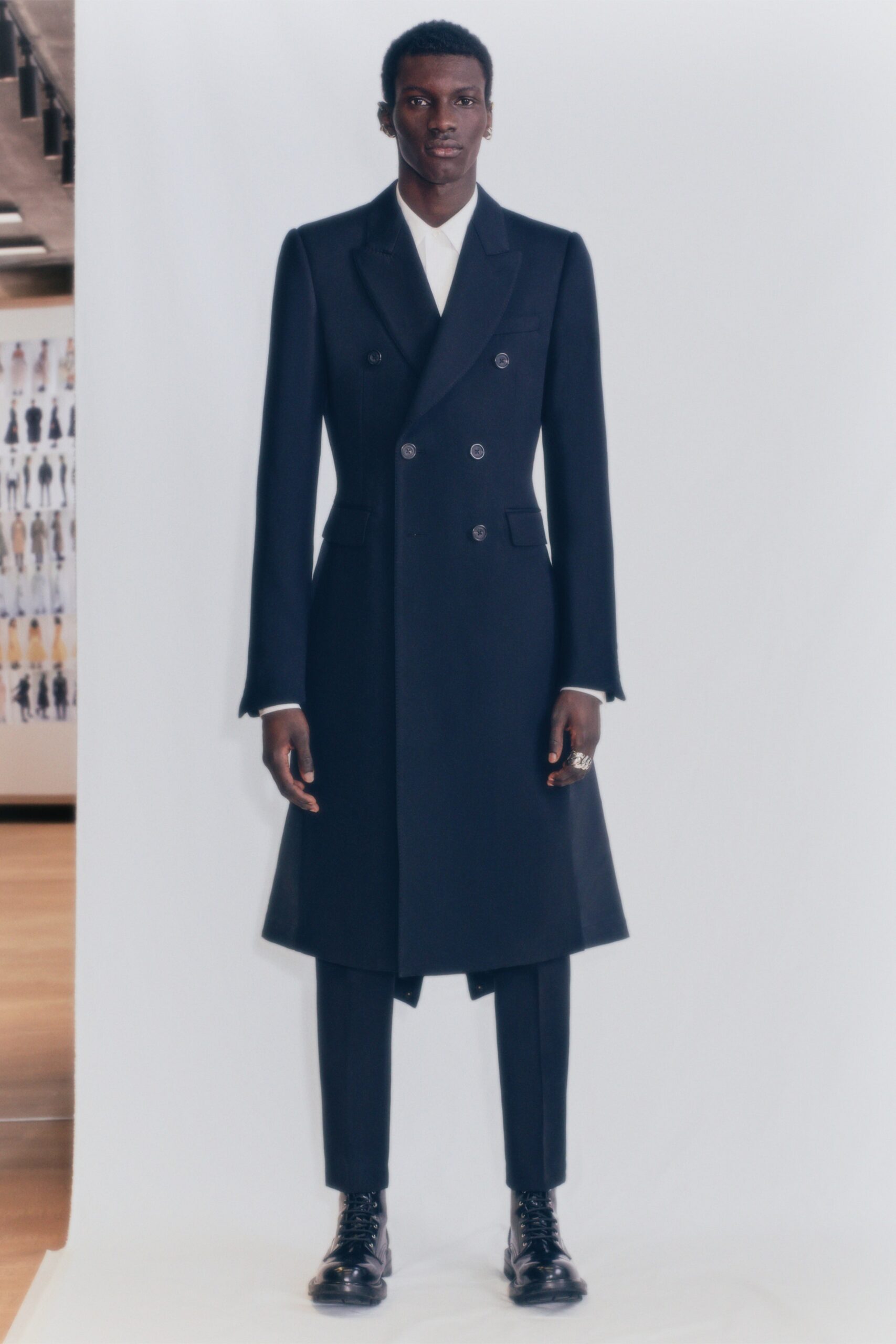 black tailored coat and pants