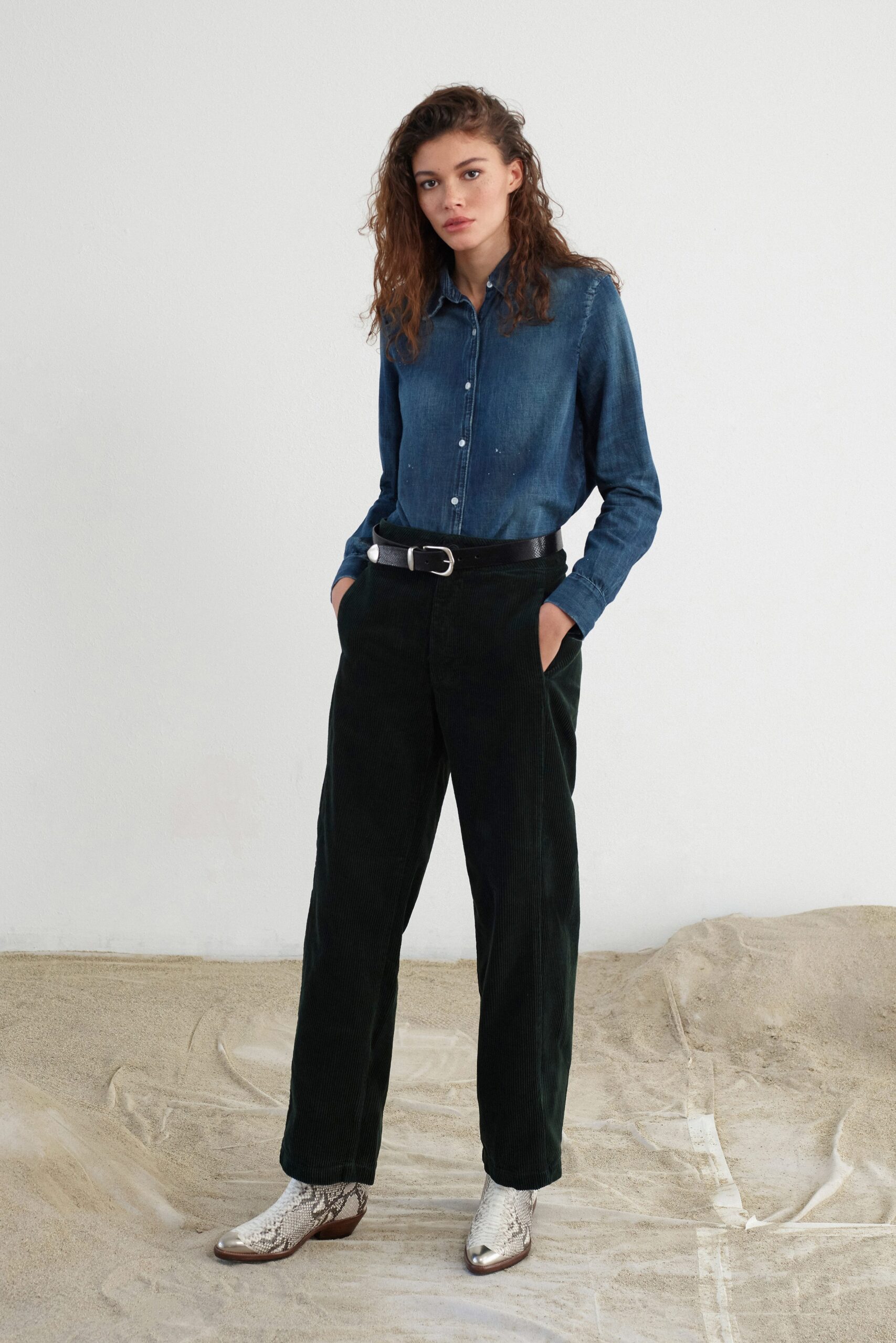 blue denim shirt with black pants
