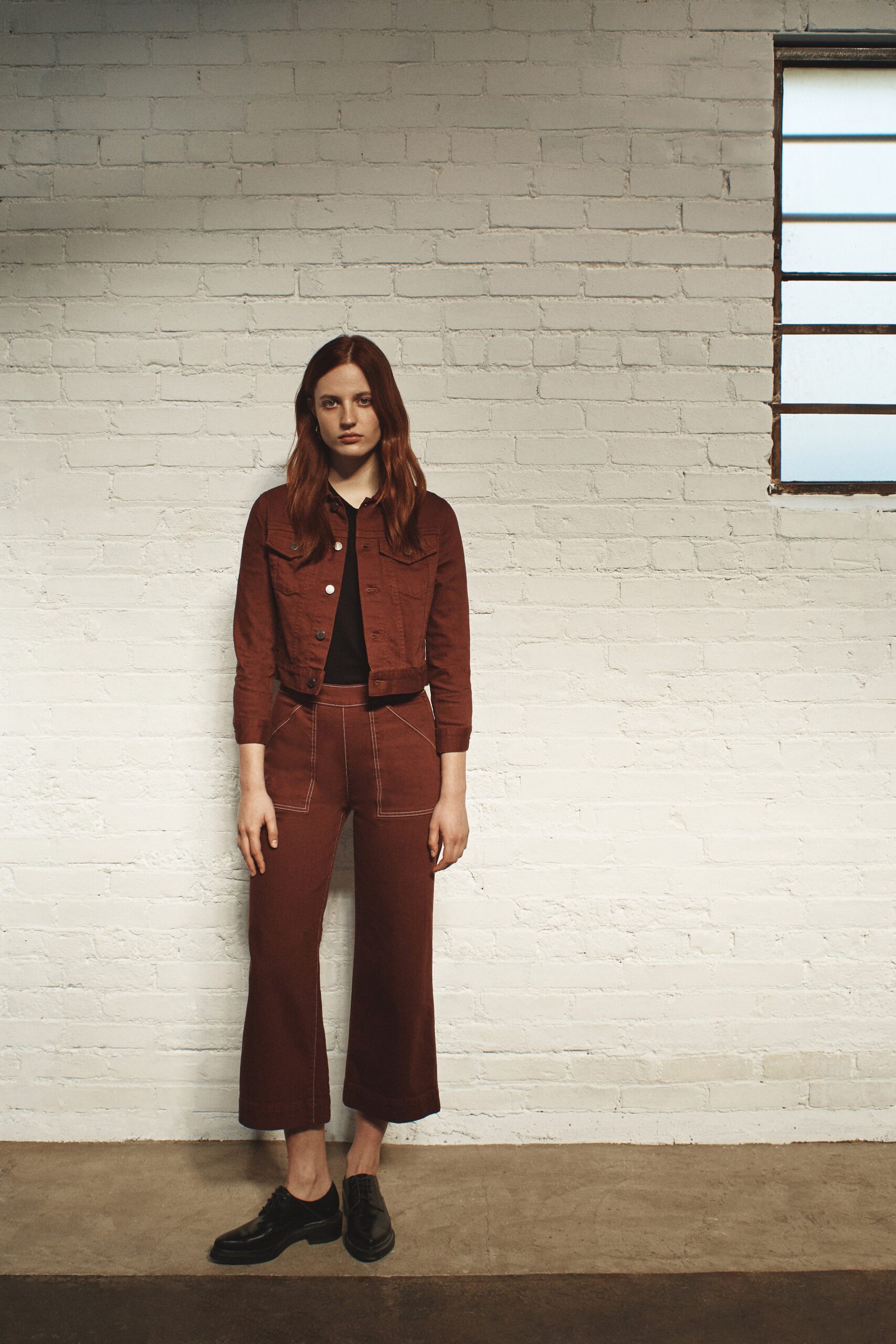 brown fitted jacket with wide-leg pants