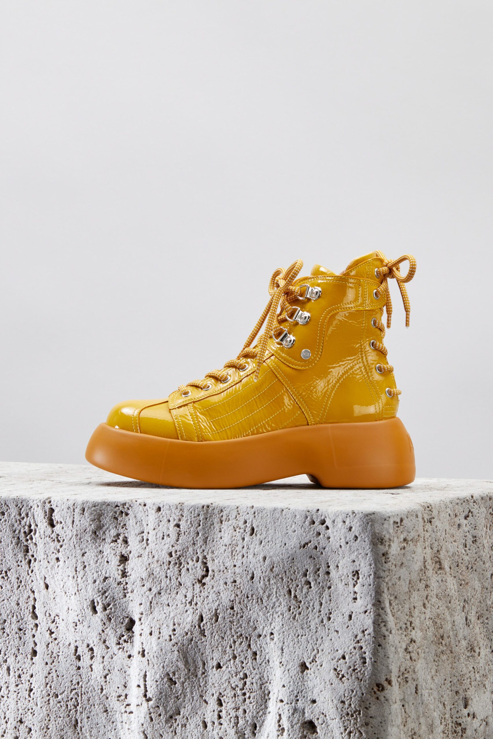 yellow vinyl zippered shoes