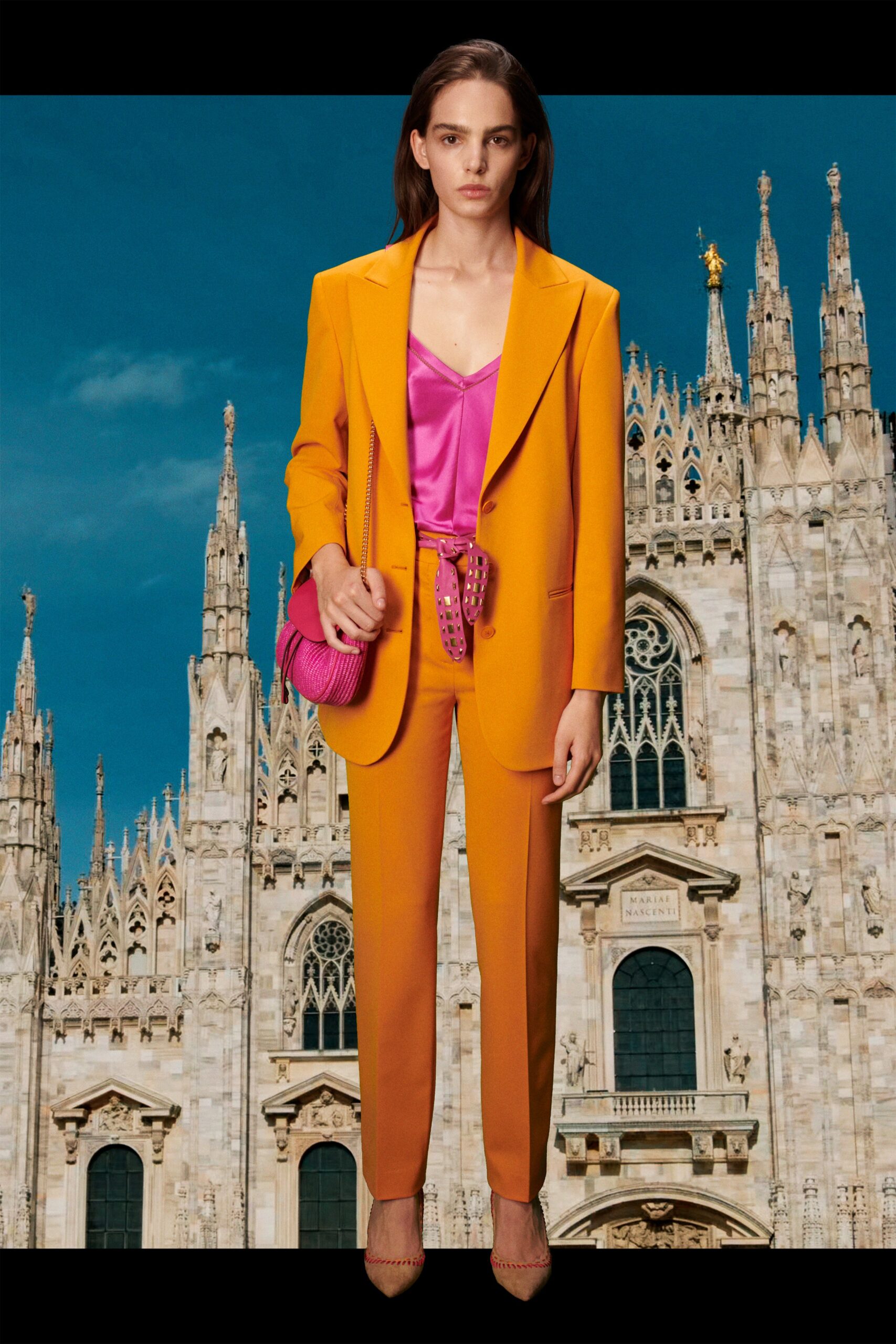 orange long-sleeve collared tailored suit