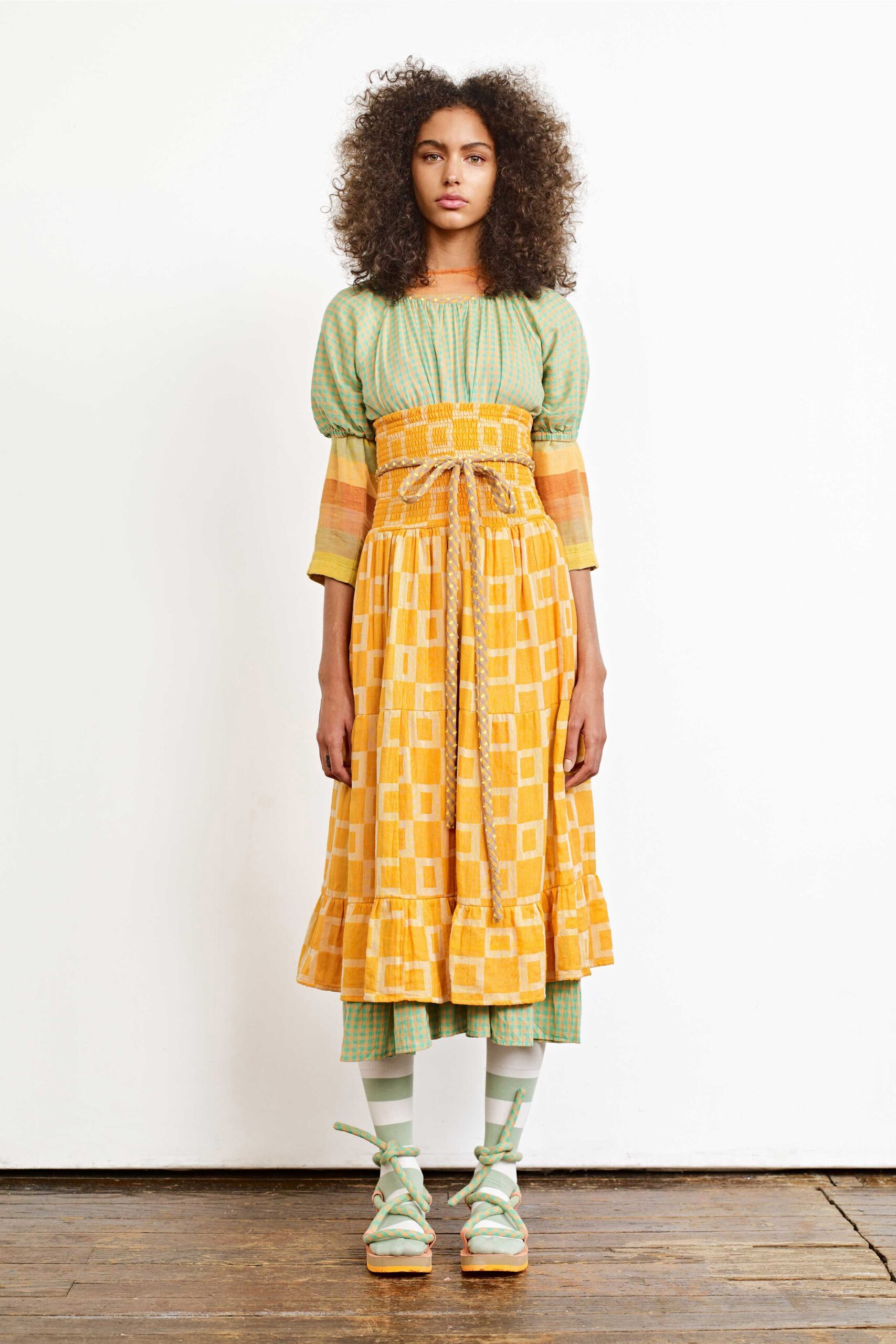 green and yellow pleated midi dress