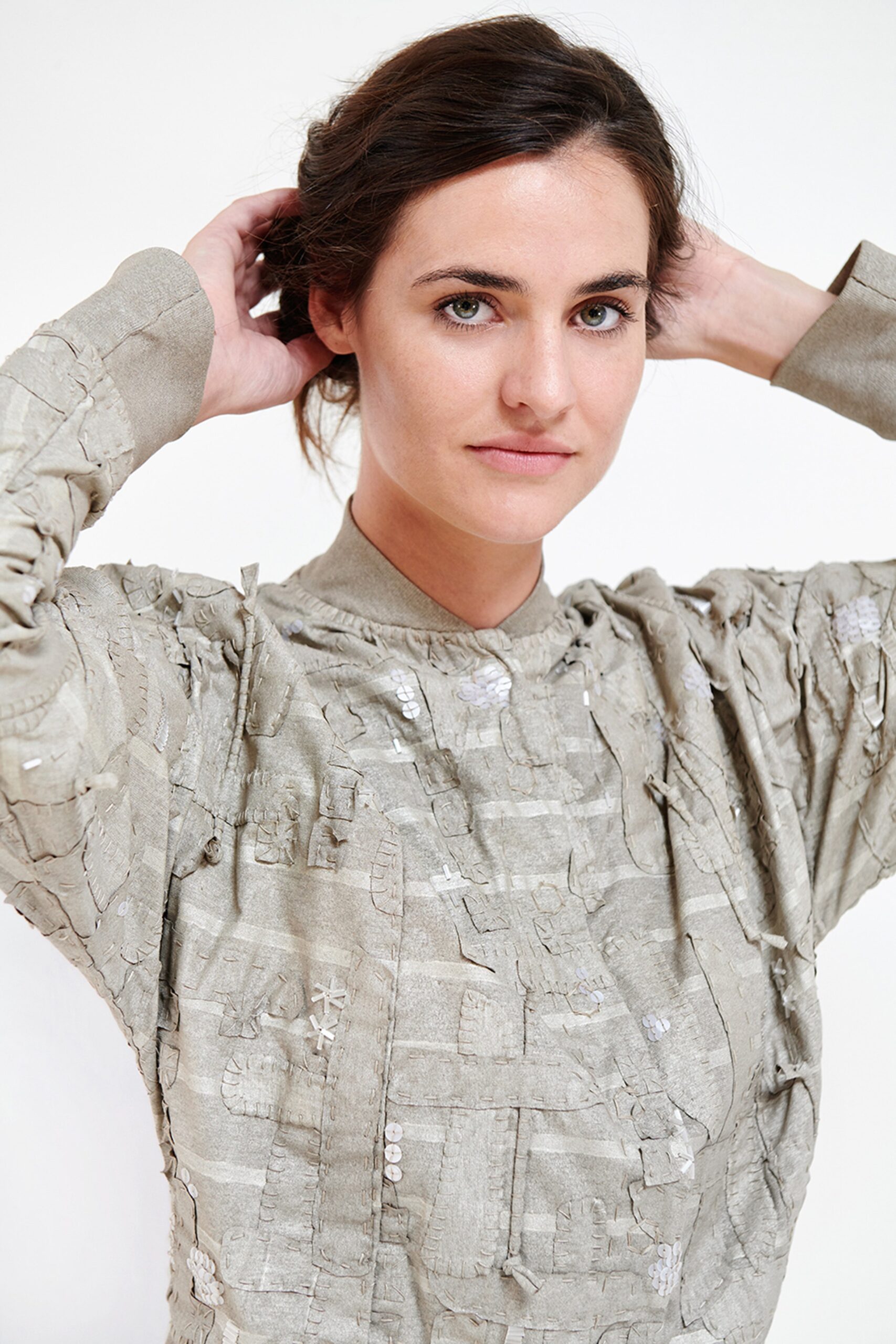 beige textured long-sleeve blouse