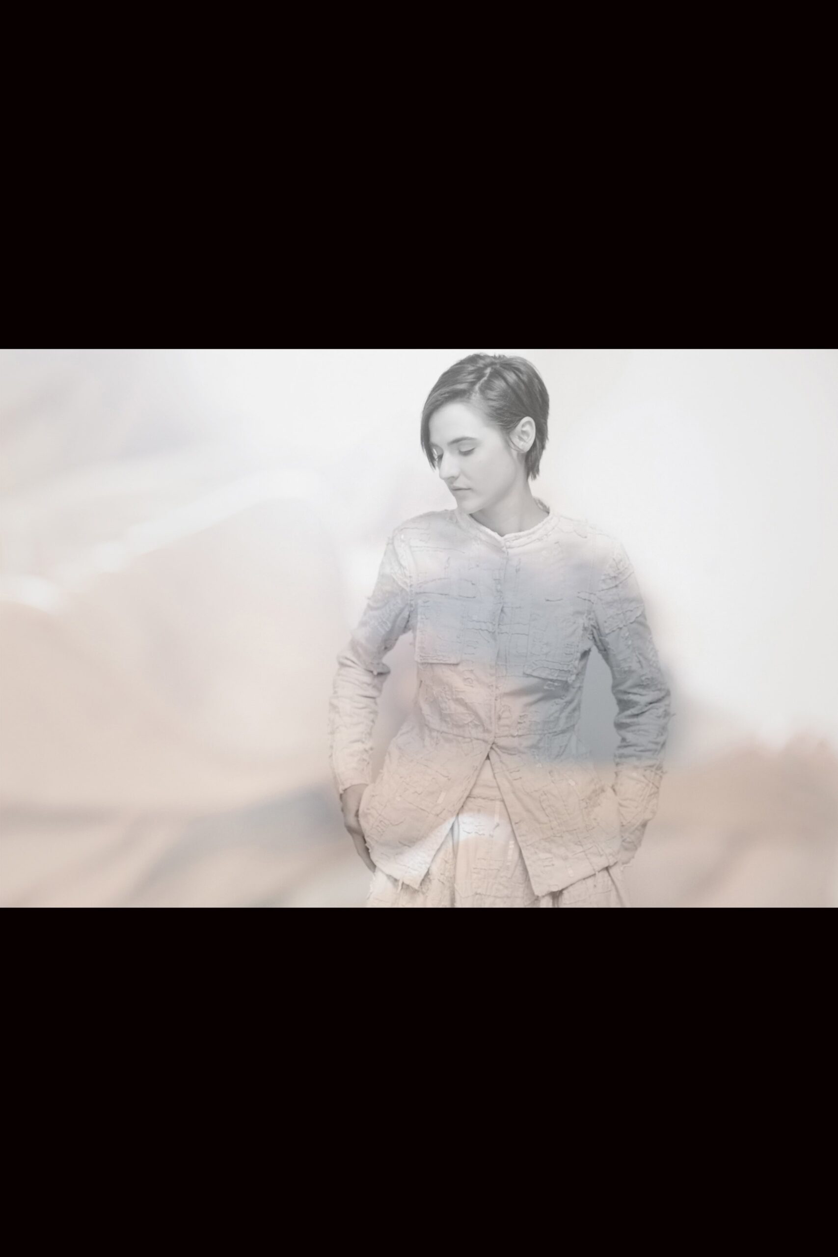 gray fitted jacket and beige dress