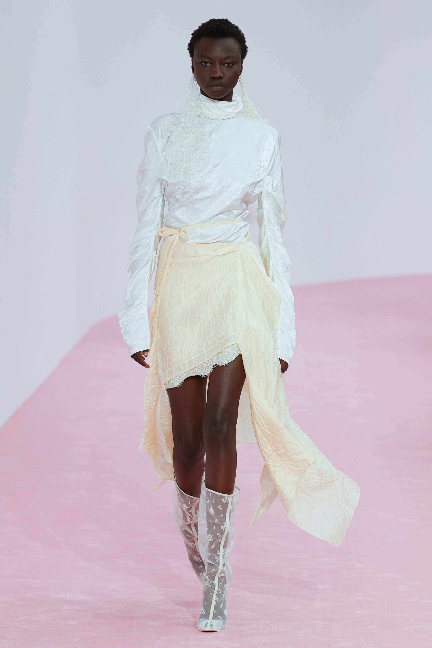 white silk asymmetric dress with boots
