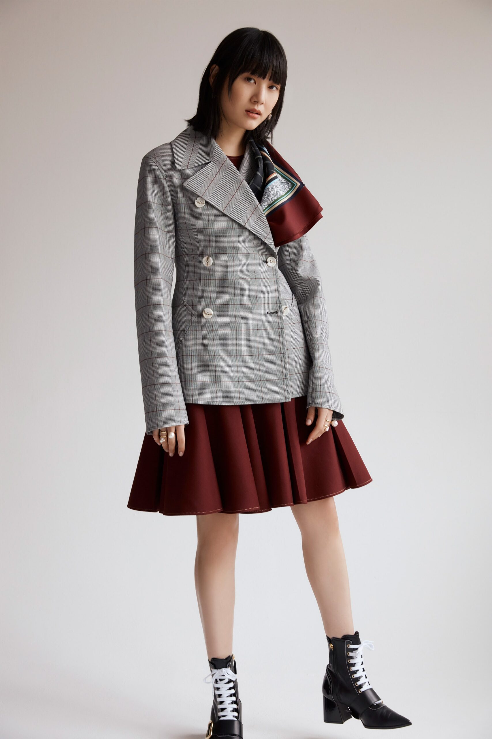 gray checked blazer with maroon skirt
