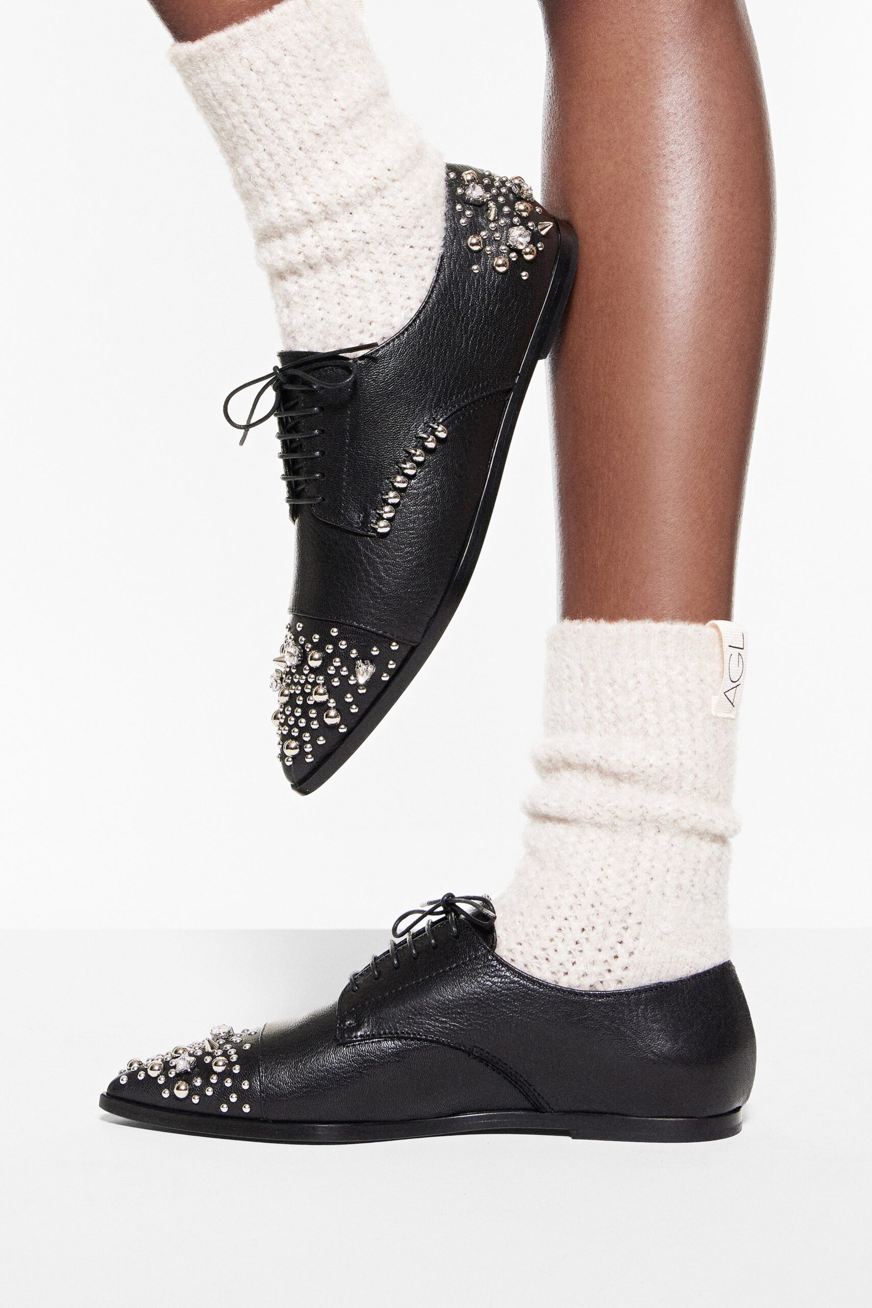 black beaded shoes with white socks