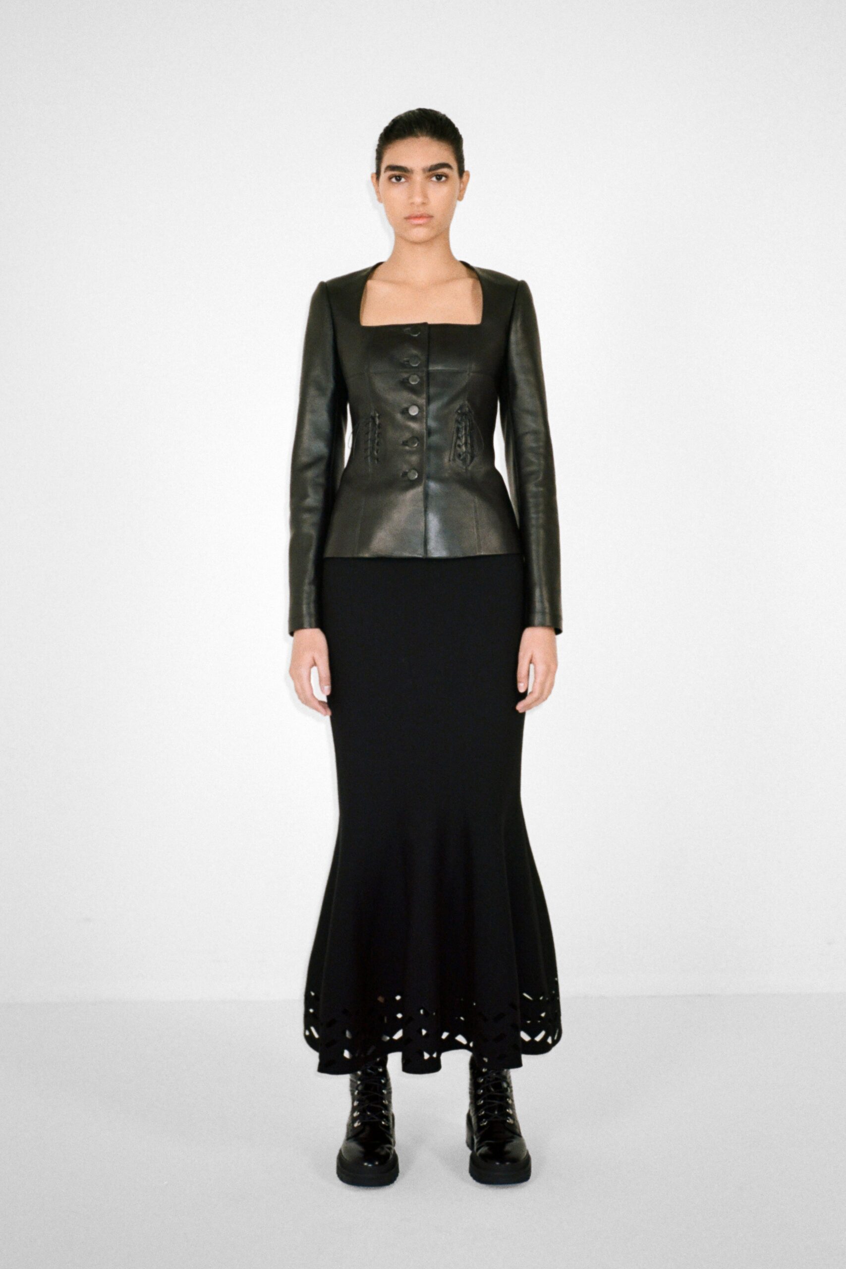 black leather fitted jacket and dress