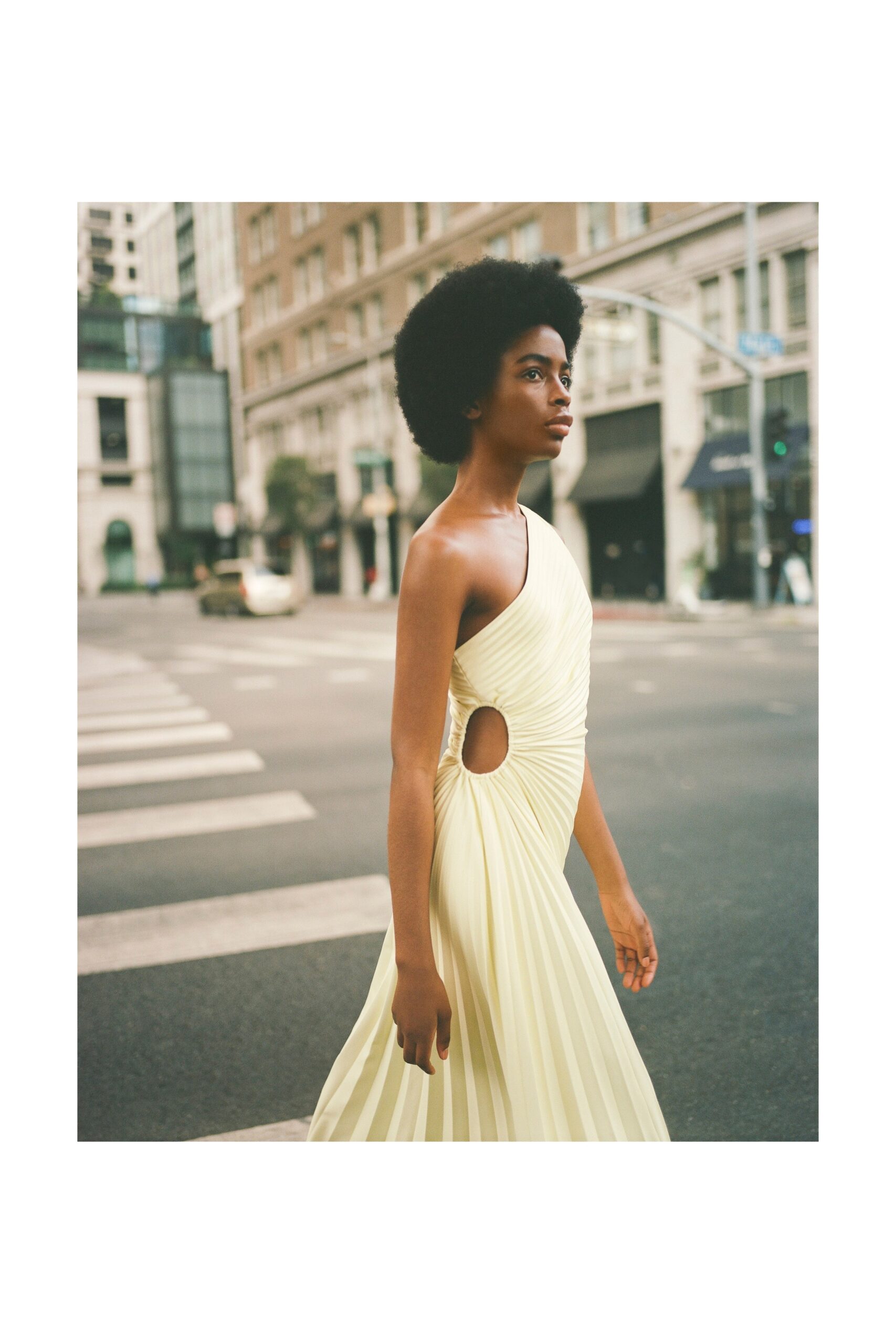 fitted yellow pleated dress