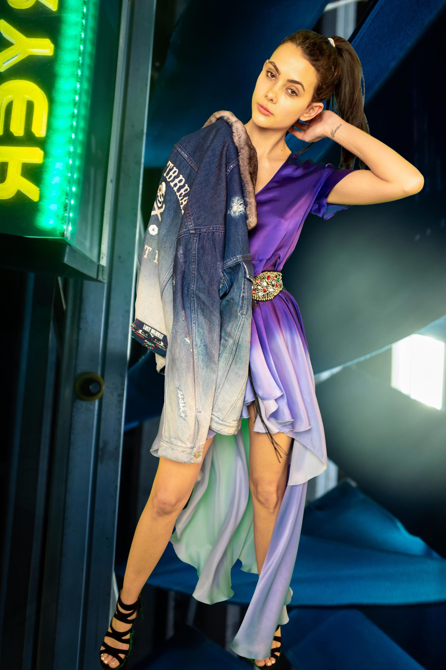purple blue green draped dress with denim jacket