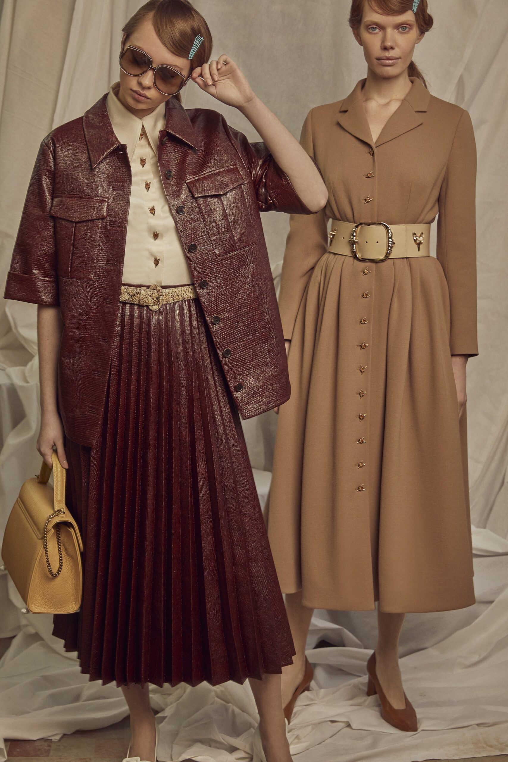 red leather short-sleeve collared relaxed buttoned pockets jacket