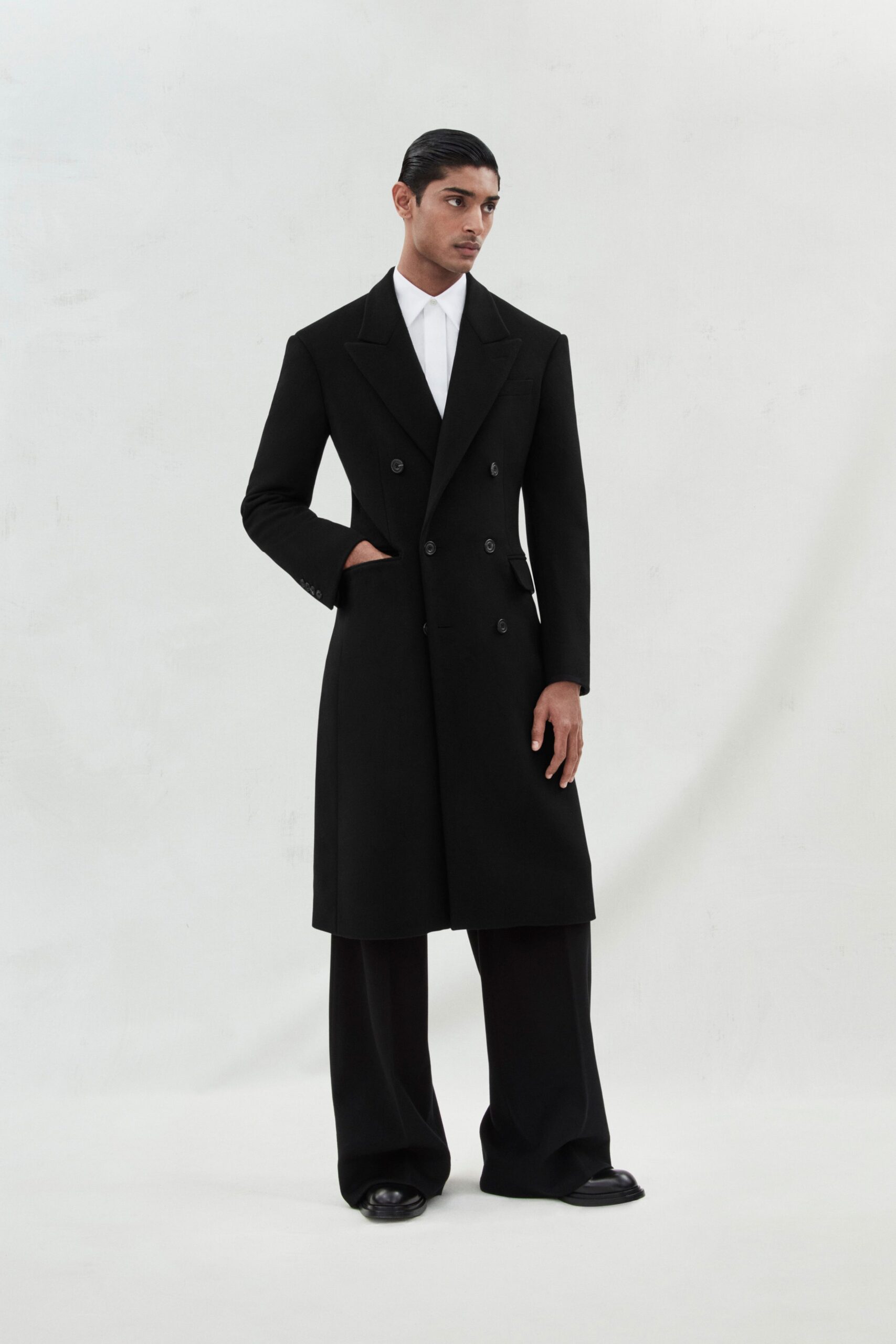 black tailored coat with white shirt