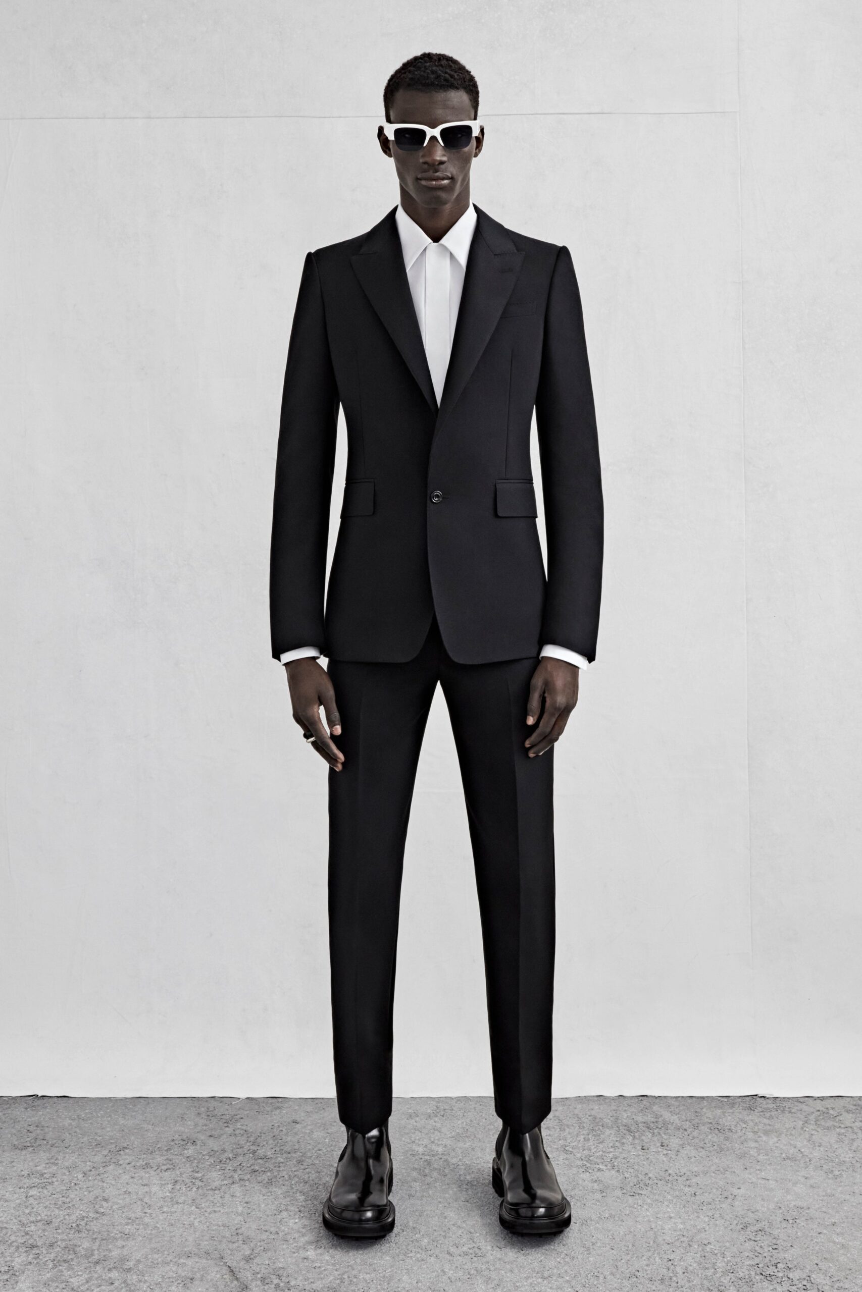 black tailored suit with white shirt
