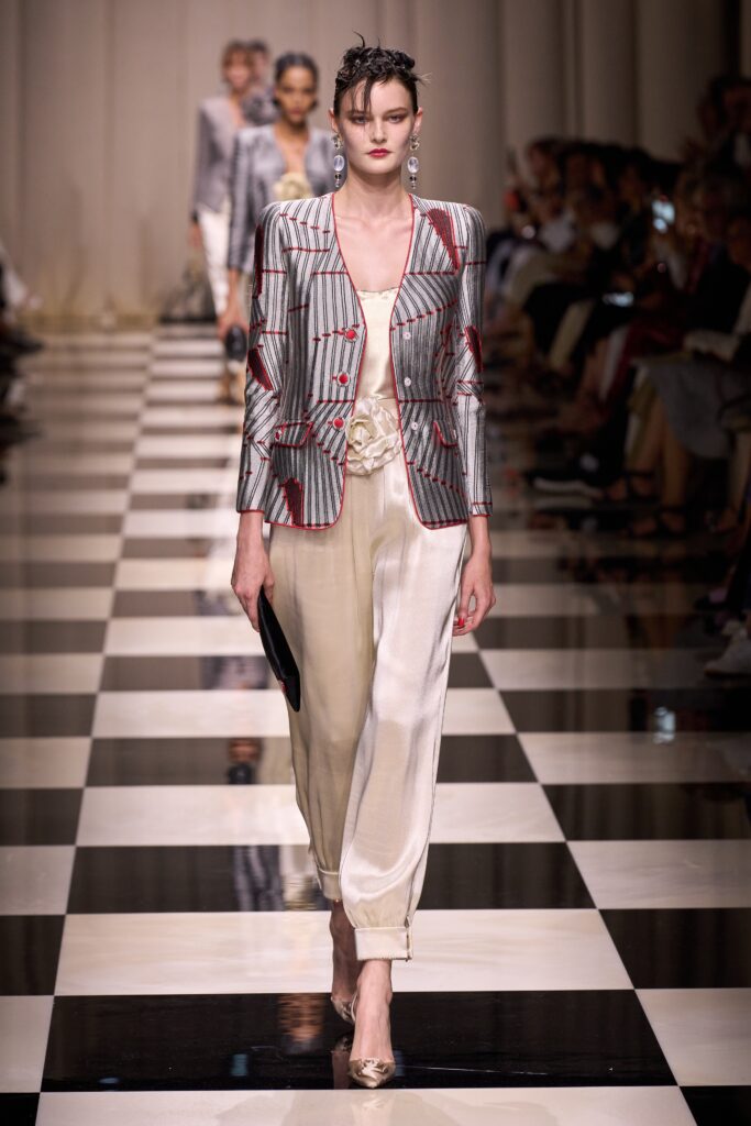 tailored gray striped blazer with beige pants