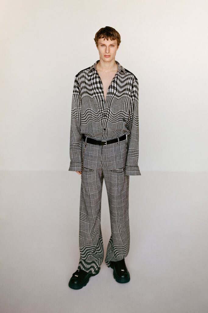 A relaxed-fit long-sleeve checked shirt paired with matching pants, featuring a collared design.