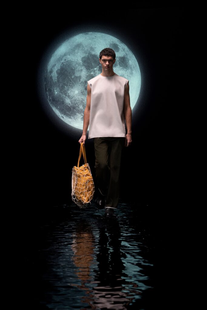 white sleeveless top with black pants