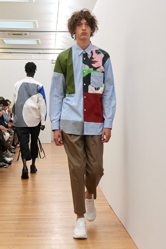 A relaxed fit long-sleeve color-blocked shirt paired with relaxed pants.