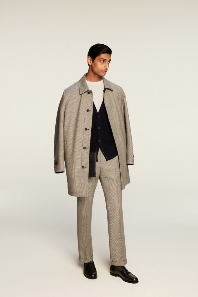 A relaxed gray striped coat paired with matching pants, featuring a collared long-sleeve design.