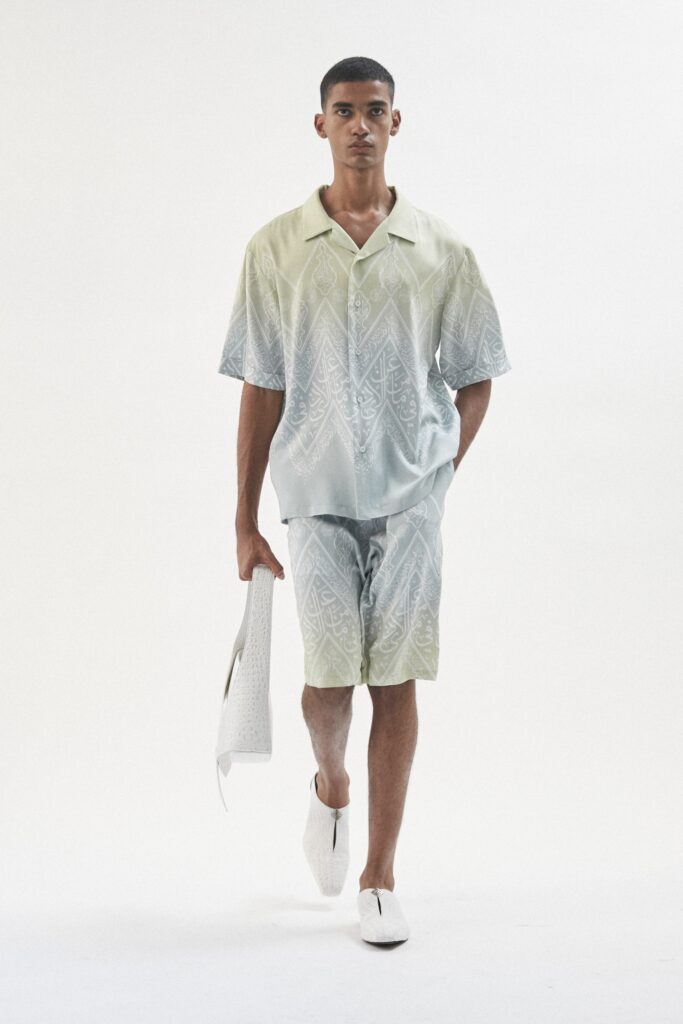 A relaxed-fit blue and green printed shirt paired with matching shorts.