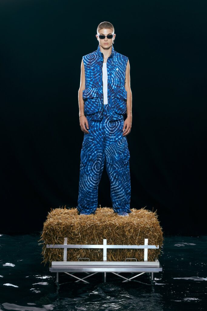 A relaxed blue printed vest paired with matching pants, showcasing a unique design.