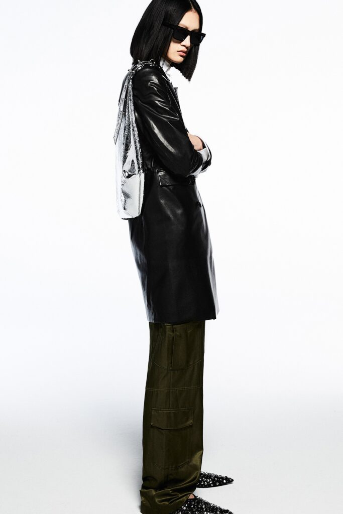 black leather coat with cargo pants