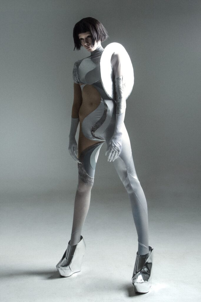 fitted white vinyl catsuit