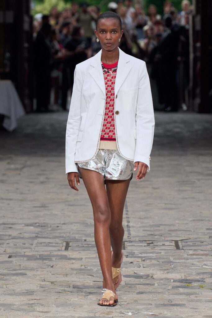 white tailored blazer with red sweater