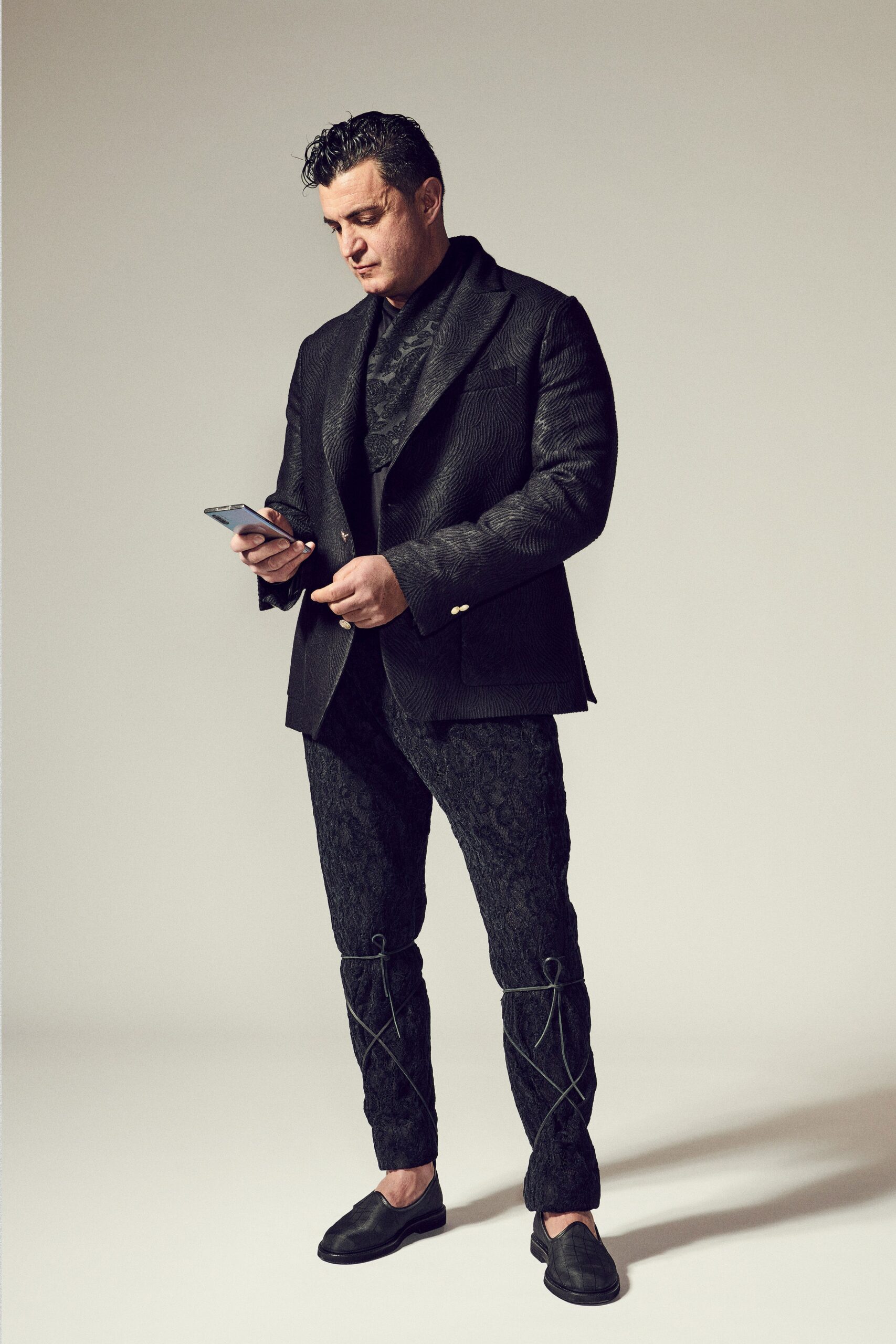 black tailored blazer and fitted pants