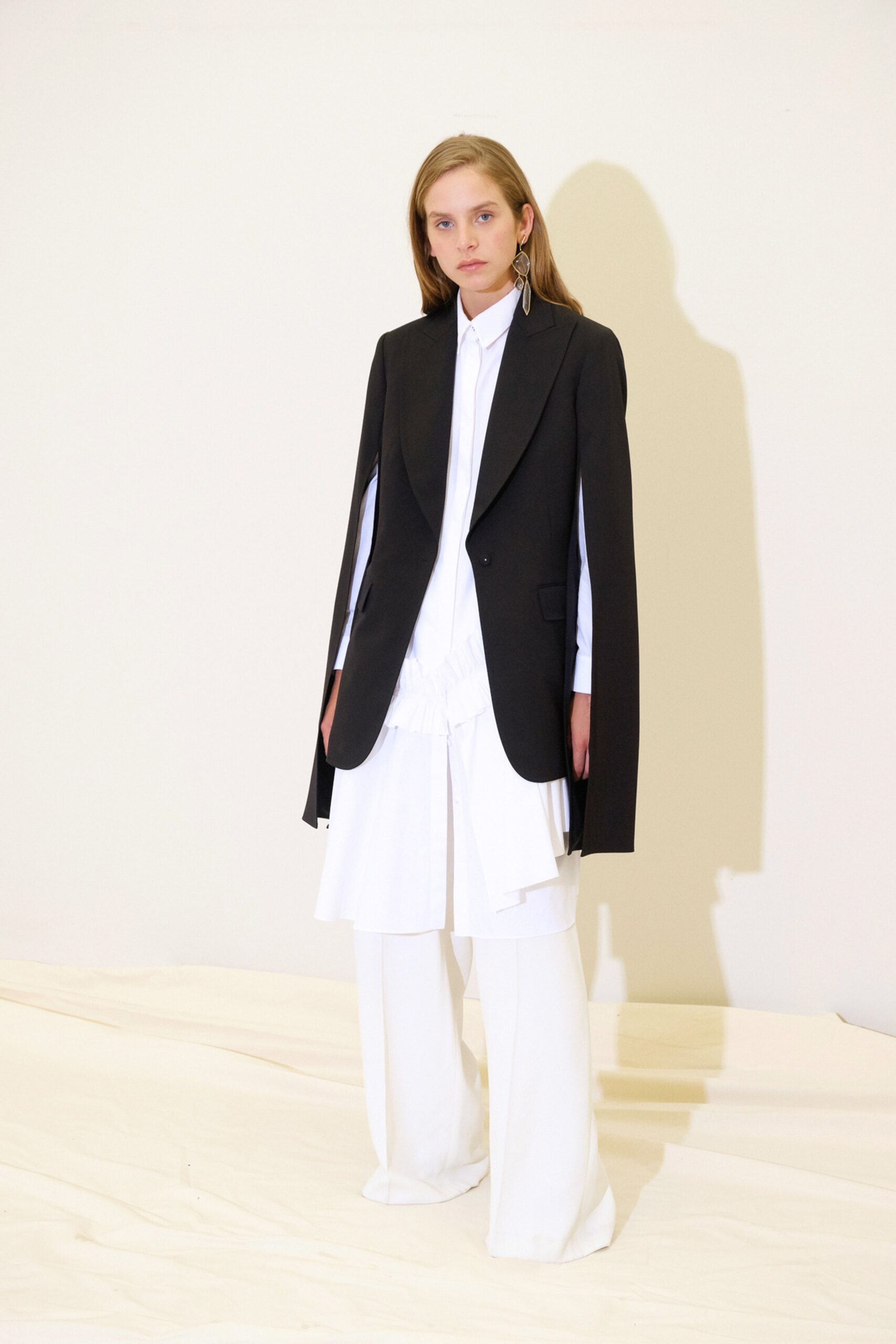 black wool long-sleeve collared structured buttoned blazer