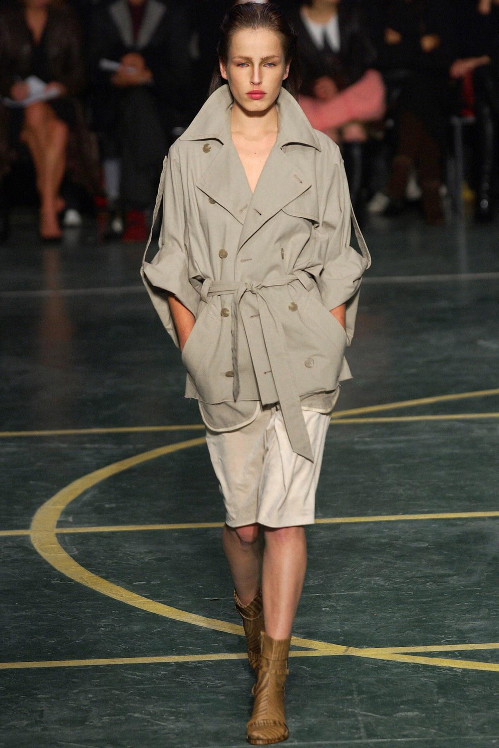 beige cotton trench coat and white skirt