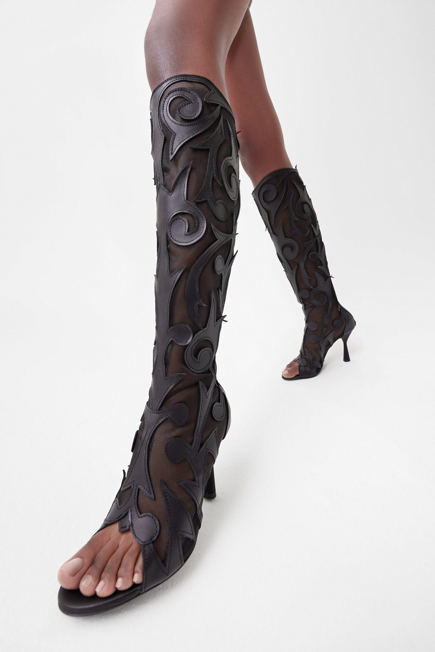black embellished leather boots